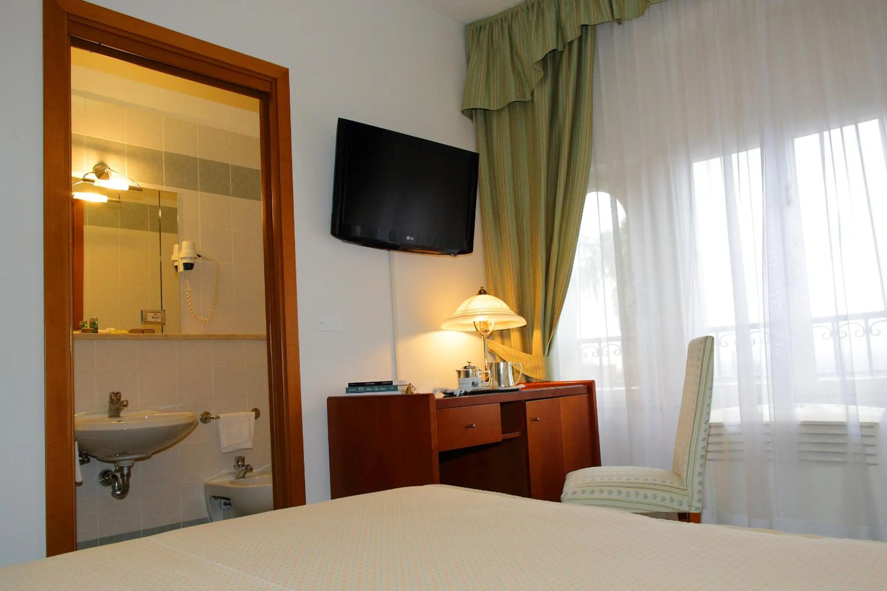 Photo of the whole room, Bed in Locanda al Castello Wellness Resort