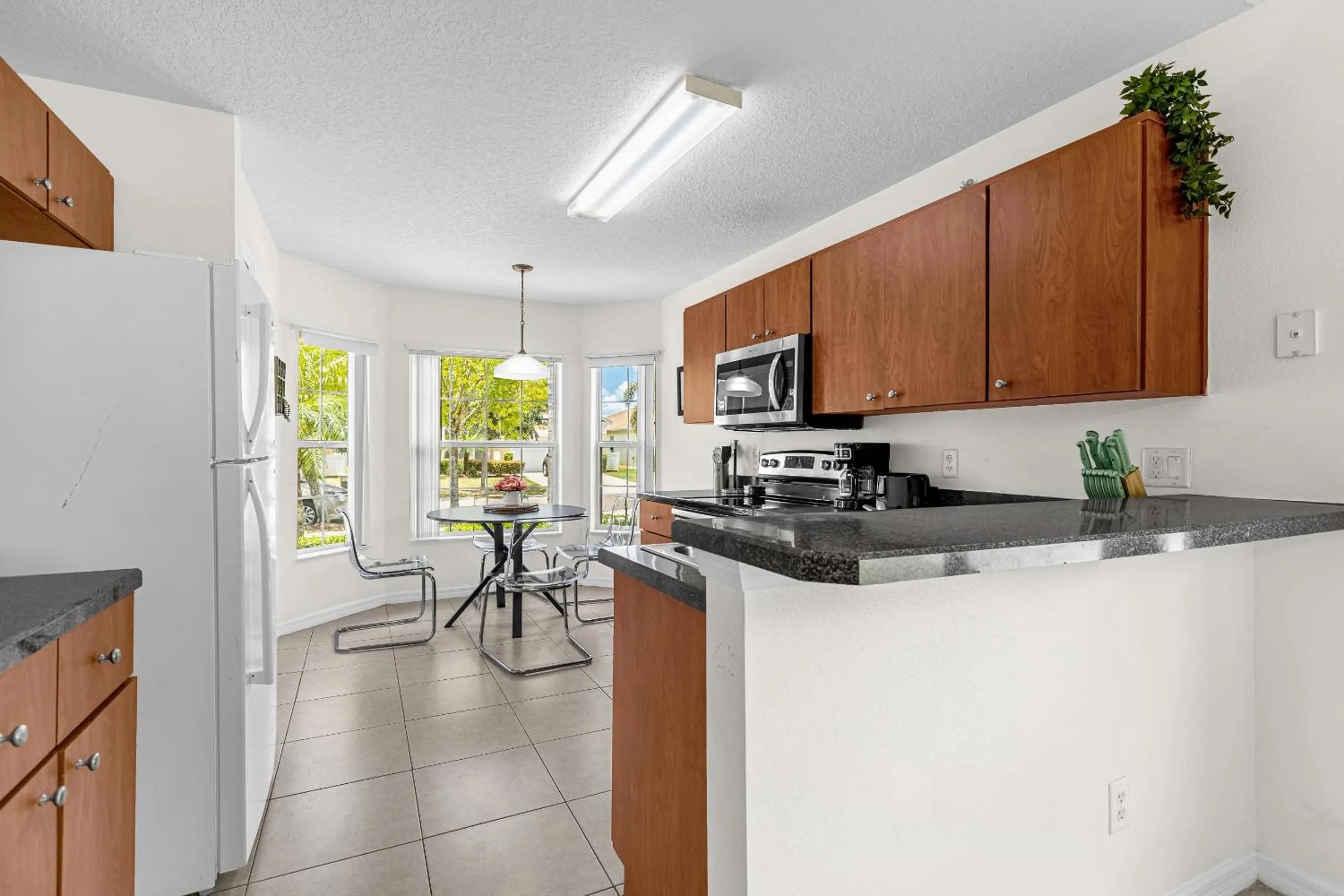 Kitchen or kitchenette in Disney Area 4BR Home with Heated Private Pool