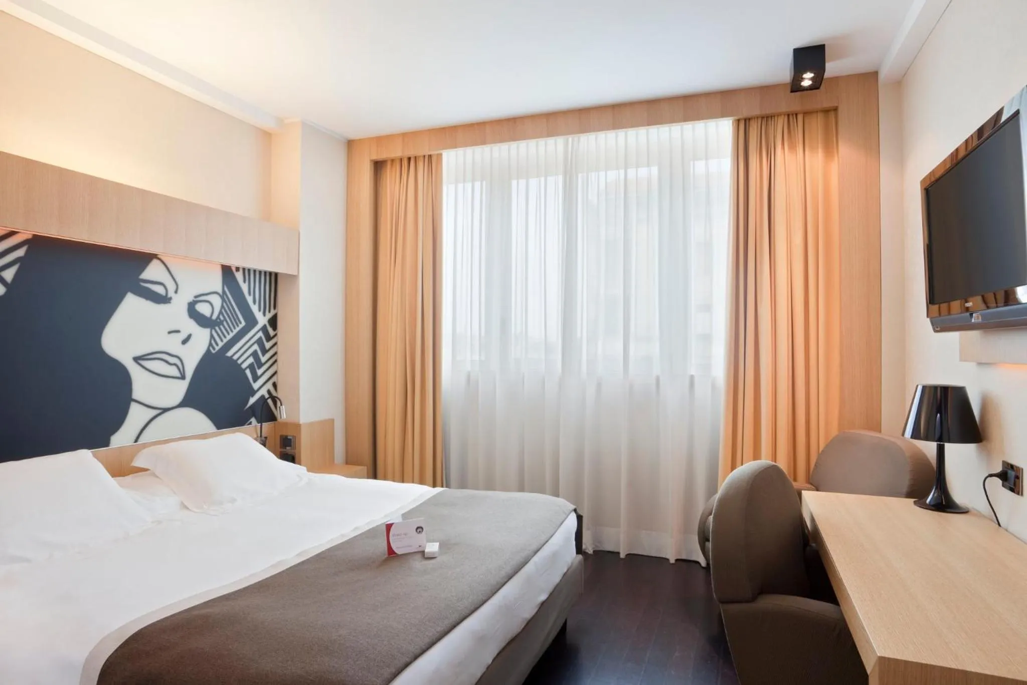 Photo of the whole room, Bed in Crowne Plaza Milan City by IHG