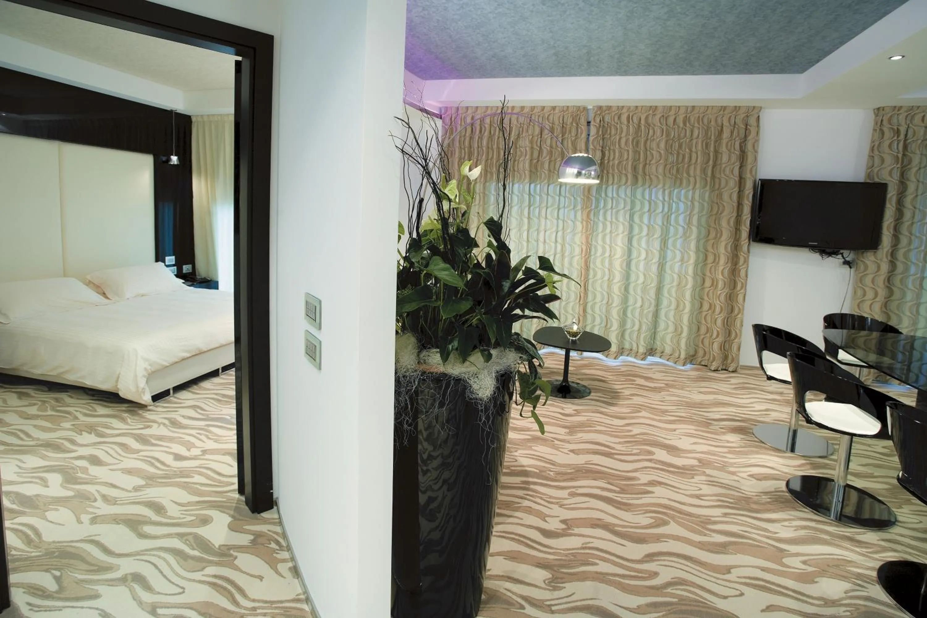 Bed in Hotel Premier & Suites - Premier Resort