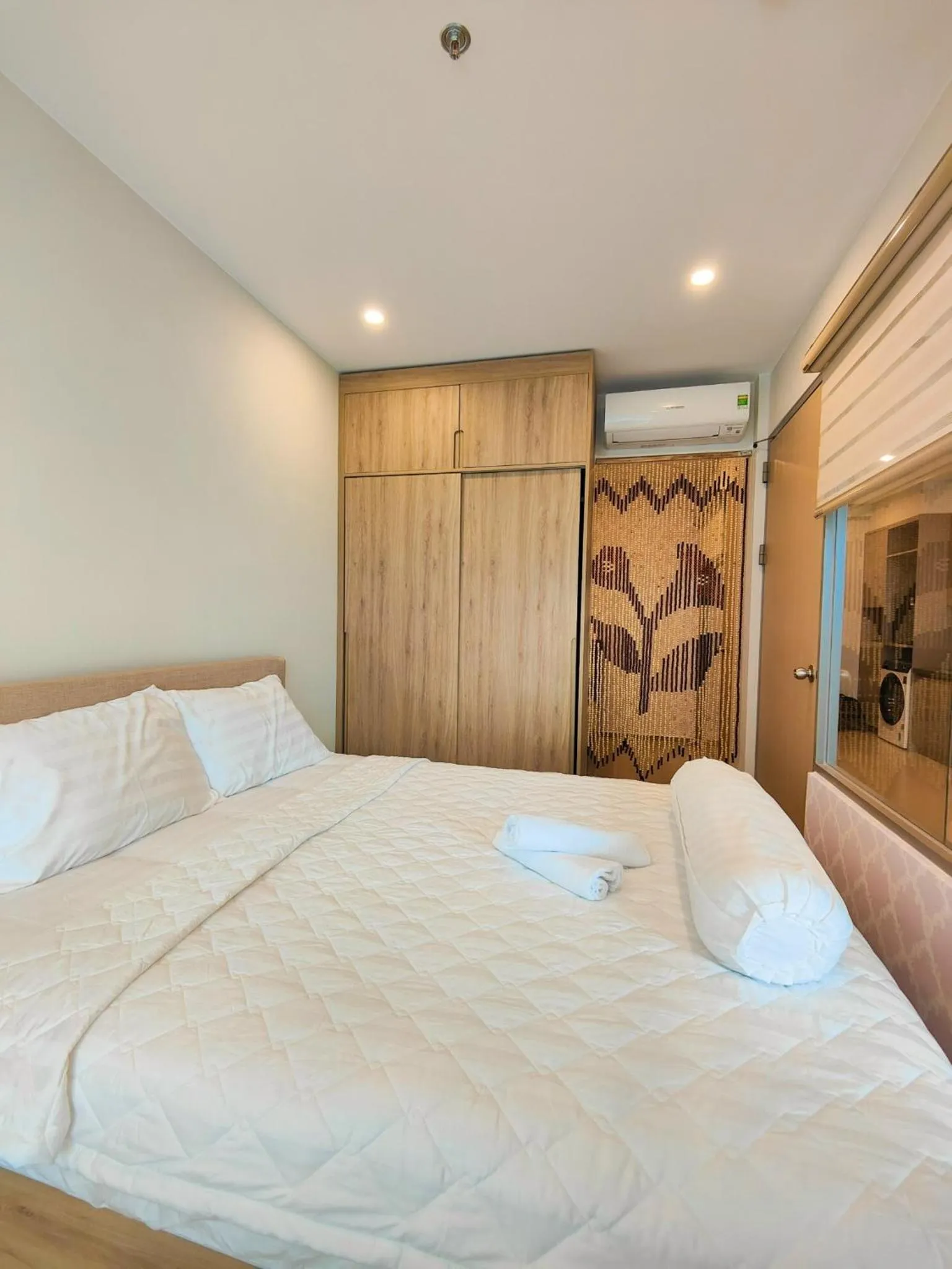 Bed in THE SÓNG CONDOTEL APARTMENT VŨNG TÀU