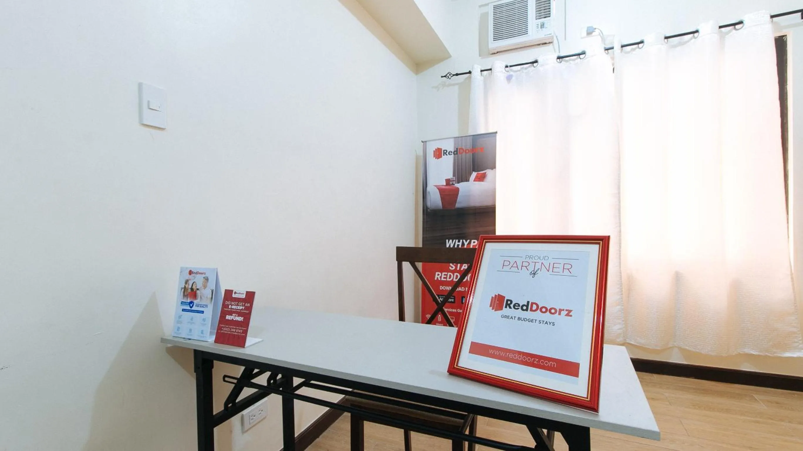 Lobby or reception in Golden Sunrise Hotel I by RedDoorz