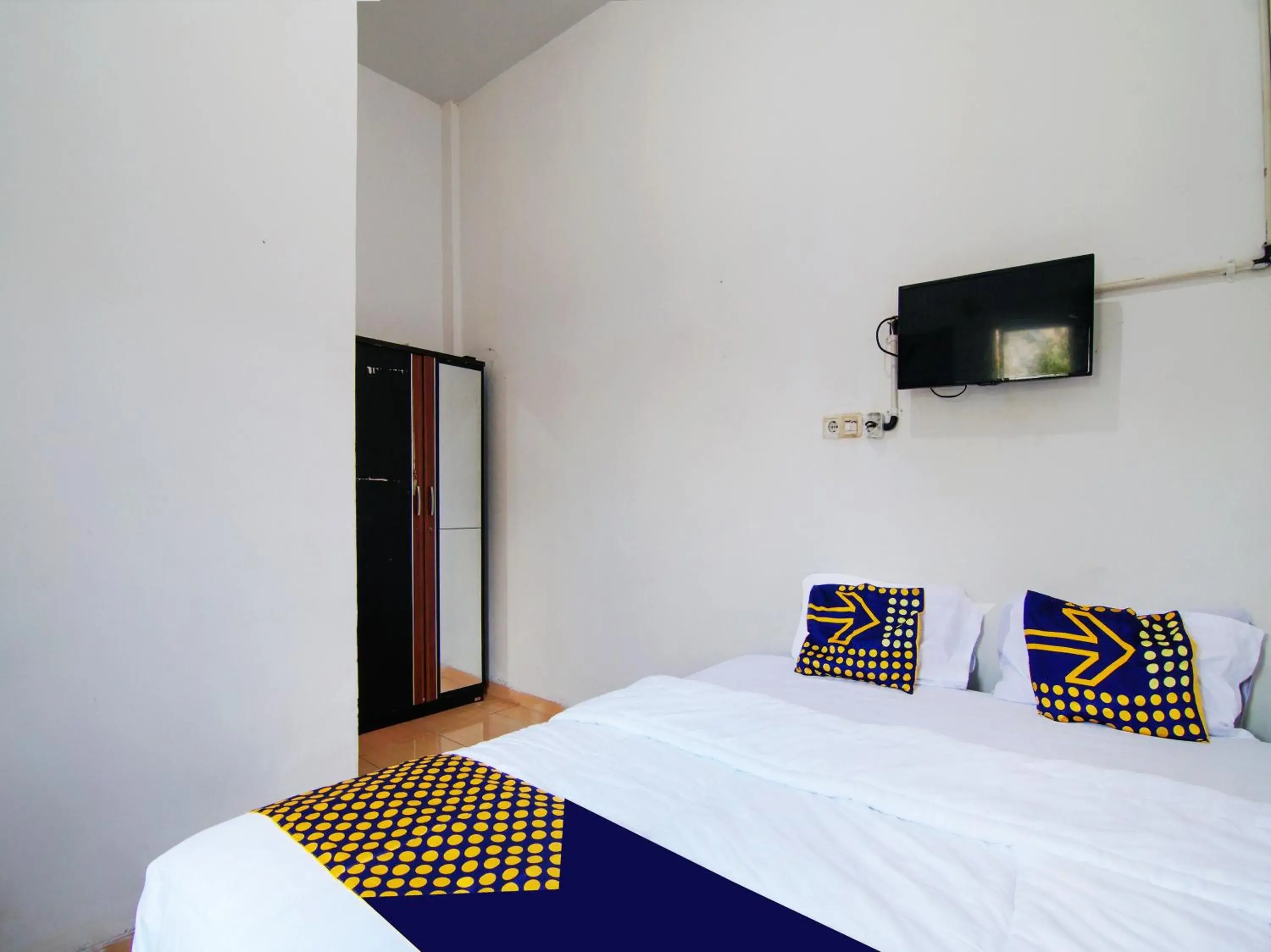 Double Room in SPOT ON 91598 Oklahoma Homestay Syariah Double Room in SPOT ON 91598 Oklahoma Homestay Syariah