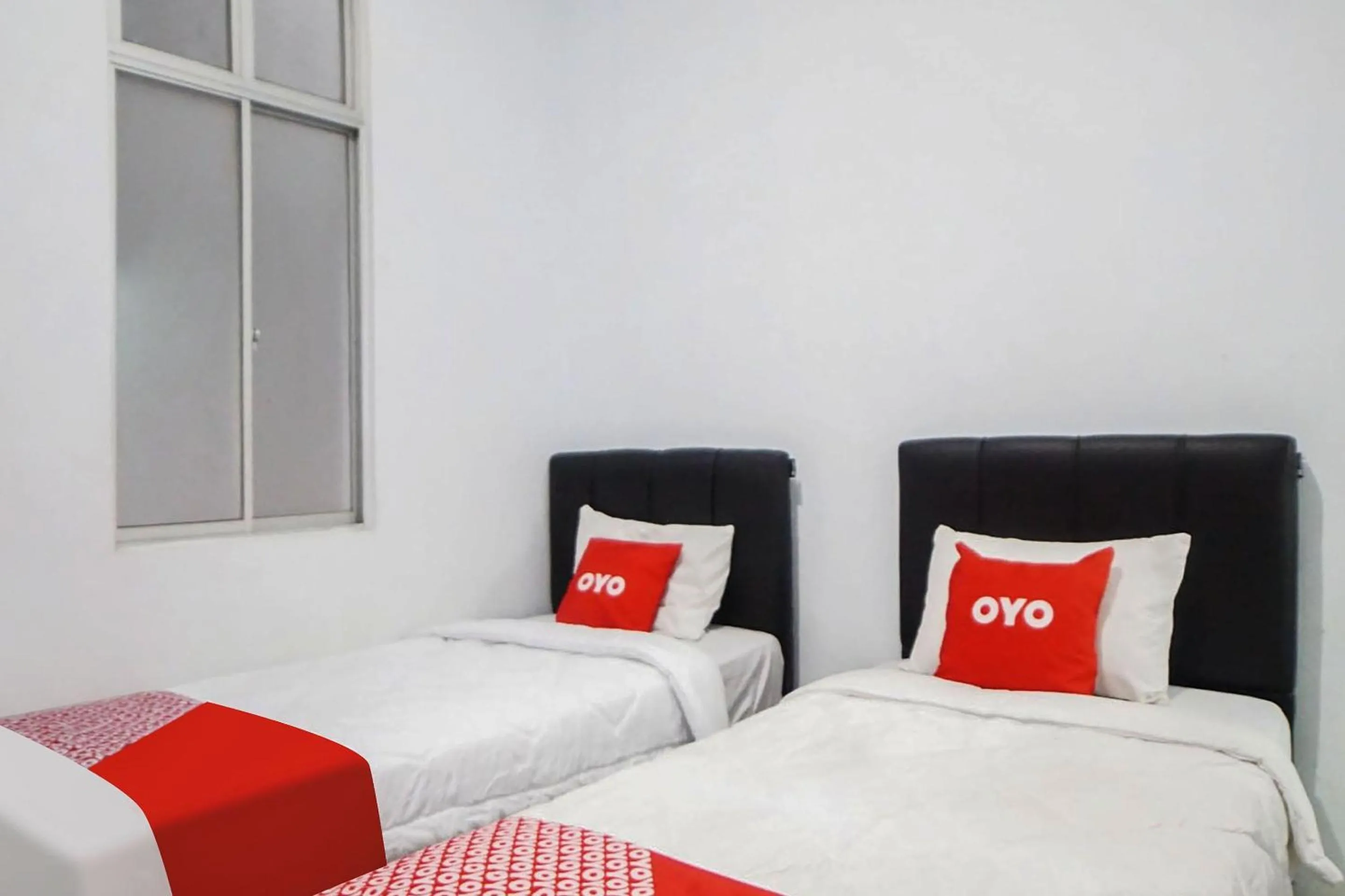 Bedroom, Bed in Hotel O Wika Wiki Homestay