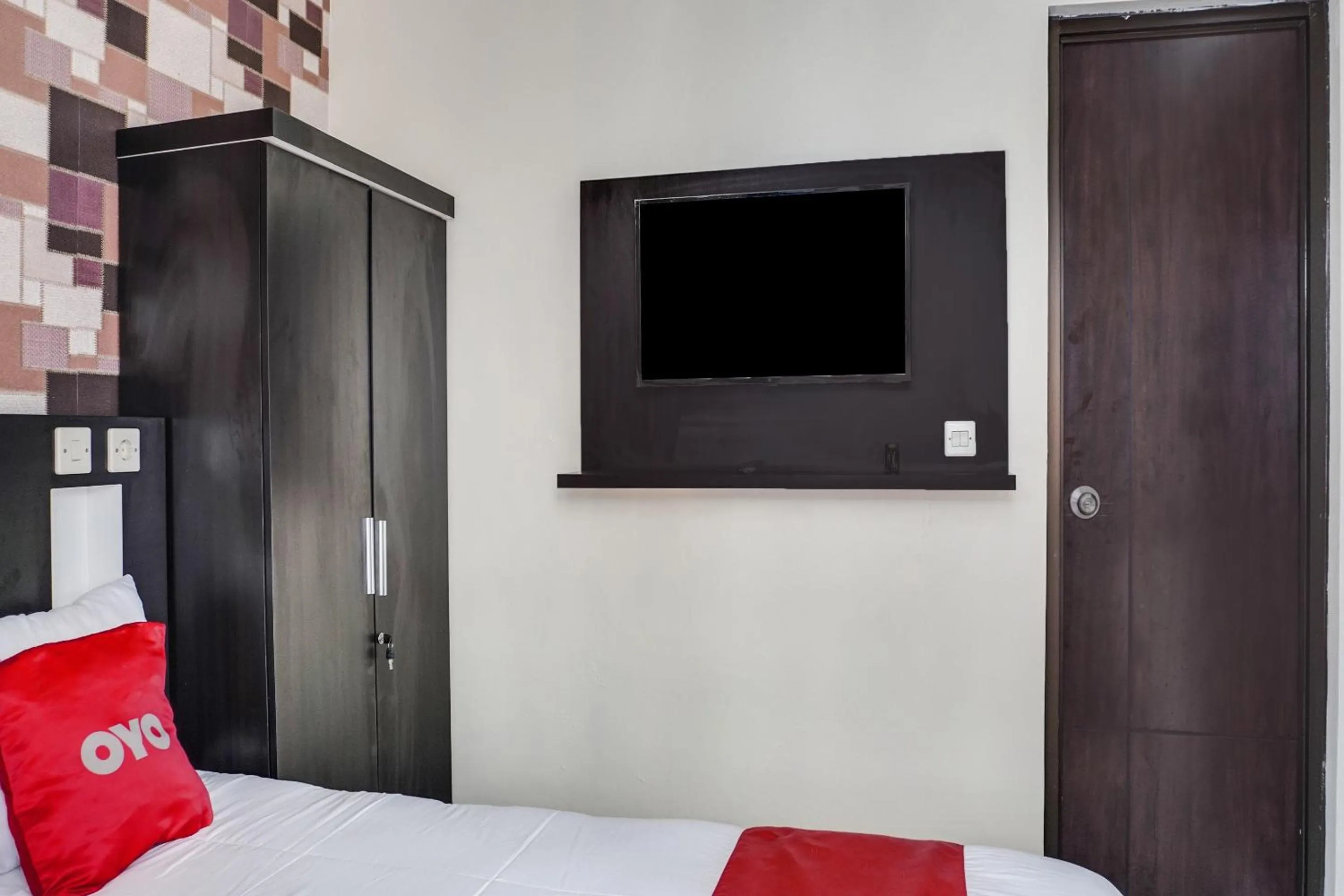 Bedroom, Bed in OYO 91646 fio colombus residence