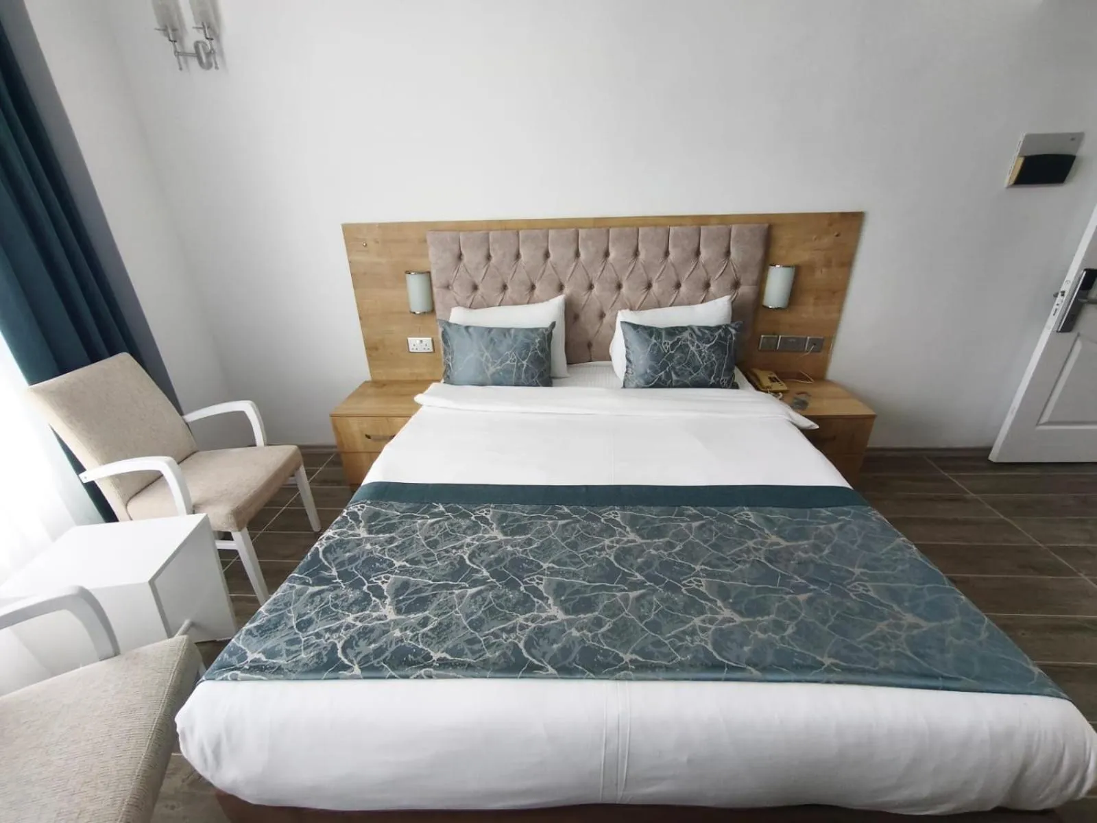 Bed in Sunport Hotel