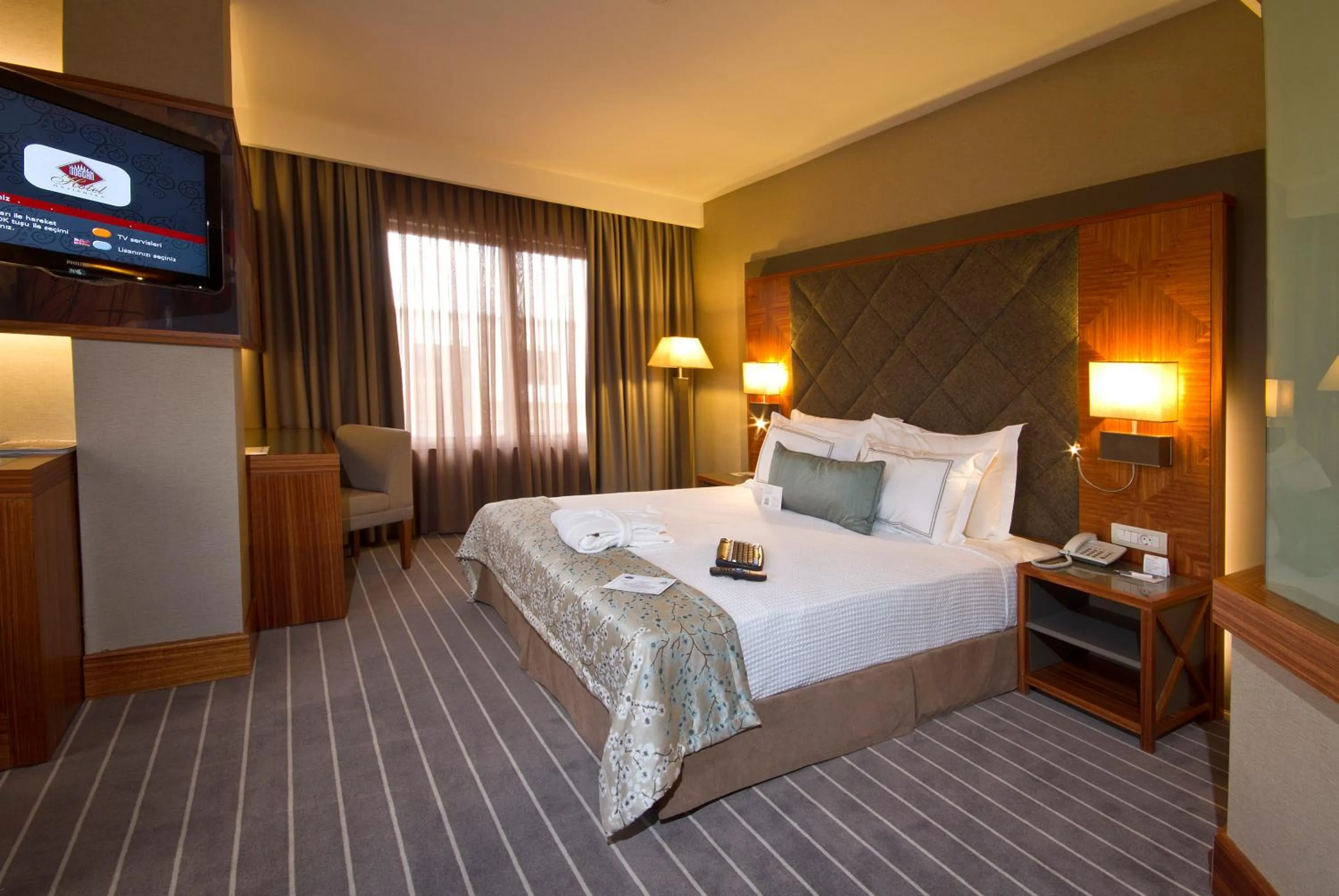 Photo of the whole room, Bed in Tugcan Hotel