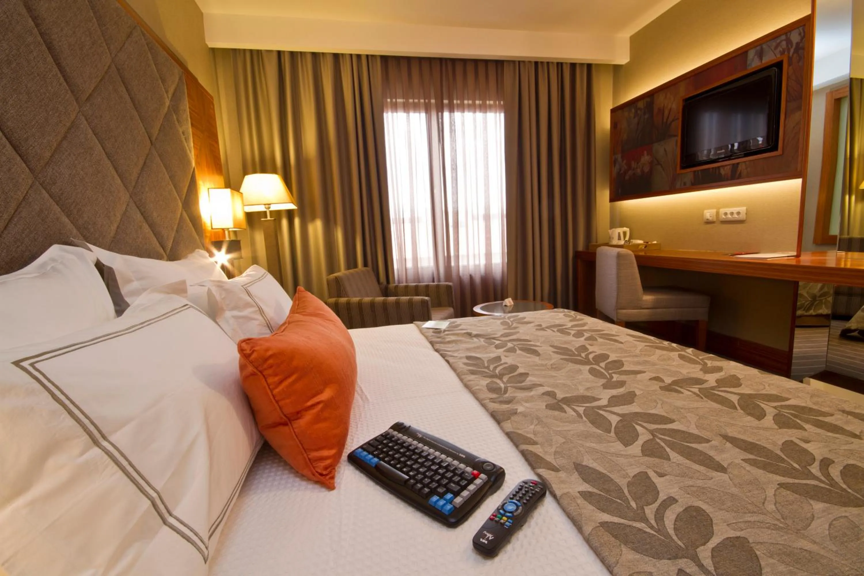 TV and multimedia, Bed in Tugcan Hotel