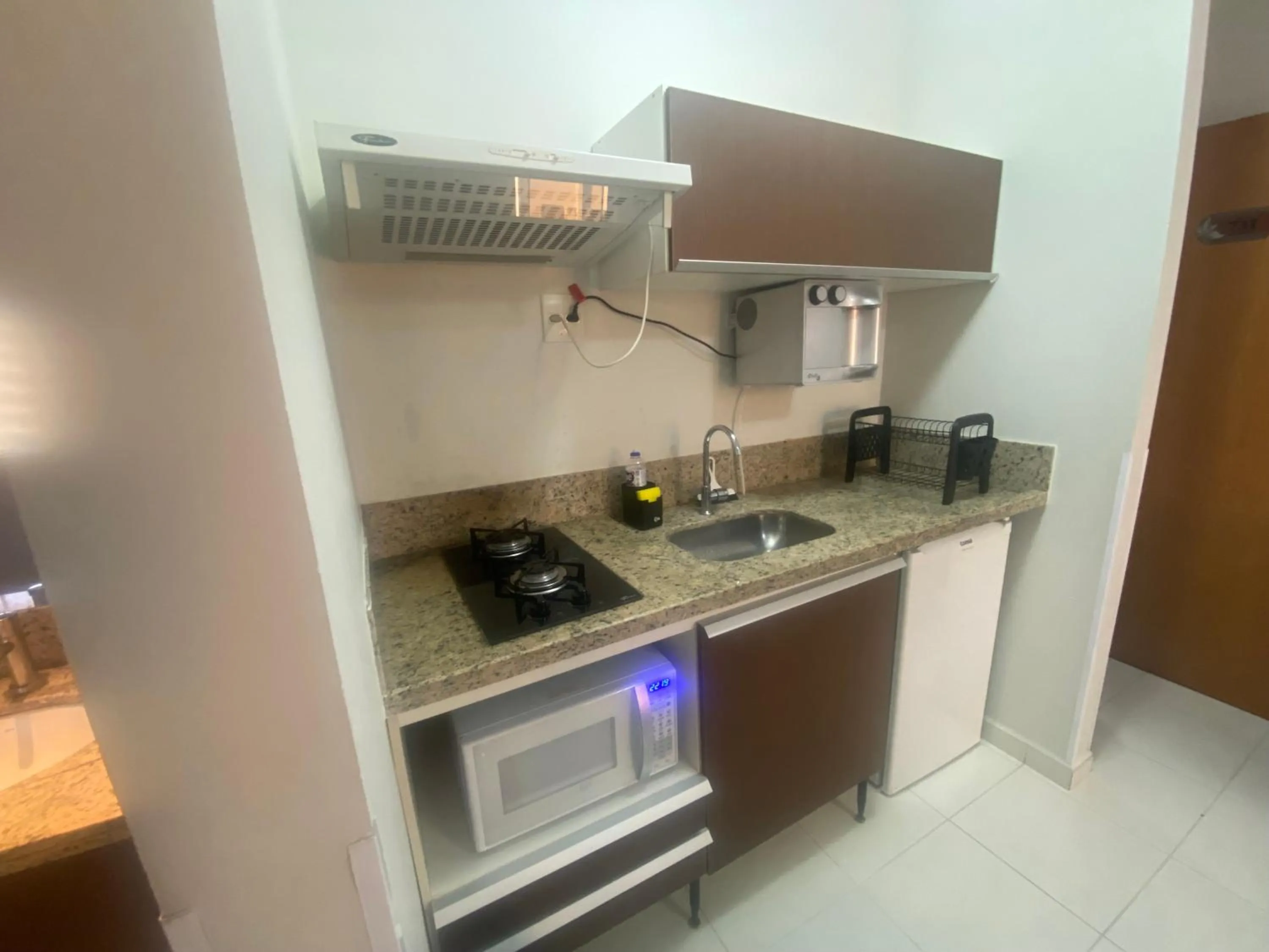 Kitchen or kitchenette in Prive Boulevard Suite Hotel
