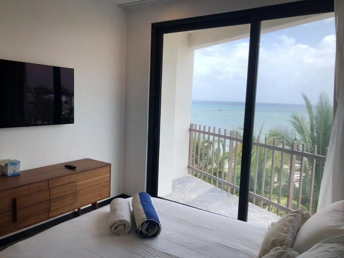 Bed in Deluxe Aparment Whit Beach & Ocean View 8 Pax