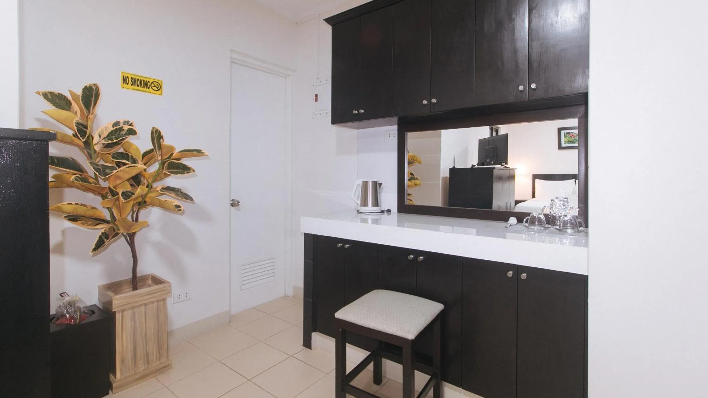 kitchen in UrbanView at Evangelista Street Makati