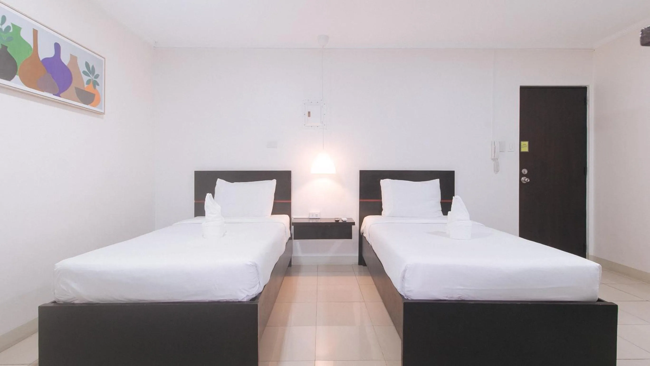 Bedroom, Bed in UrbanView at Evangelista Street Makati