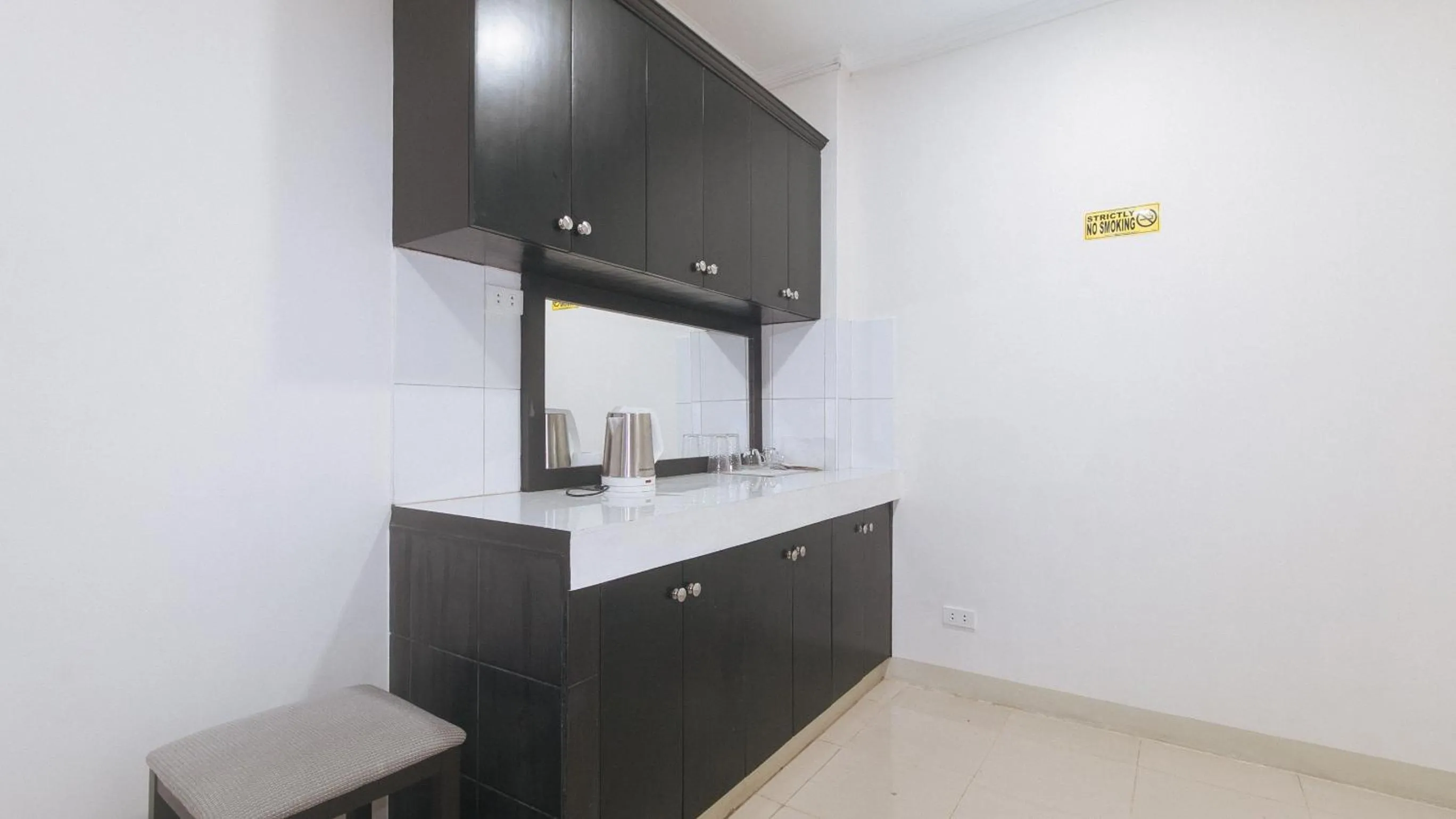 Kitchen or kitchenette in UrbanView at Evangelista Street Makati