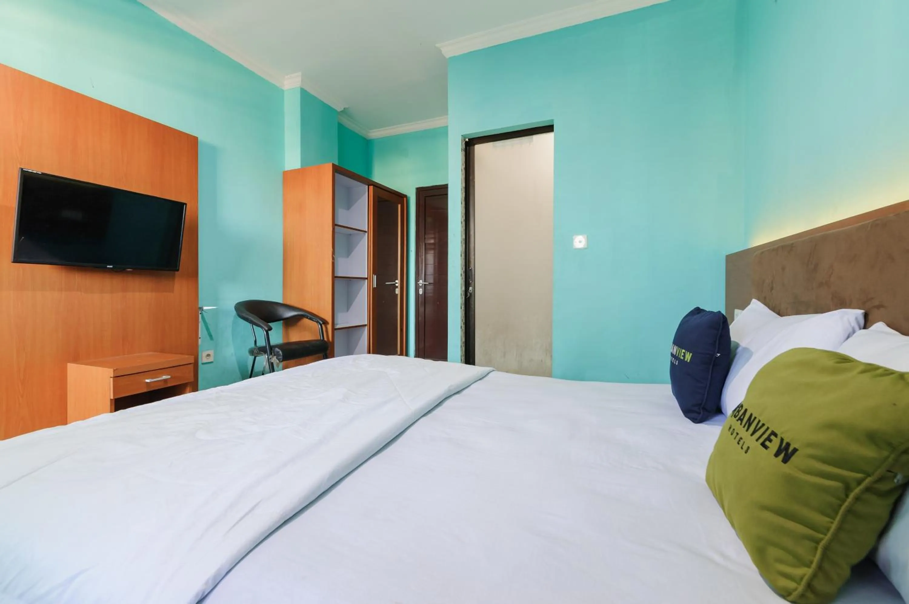 Bedroom, Bed in Gita Inn Bali RedPartner