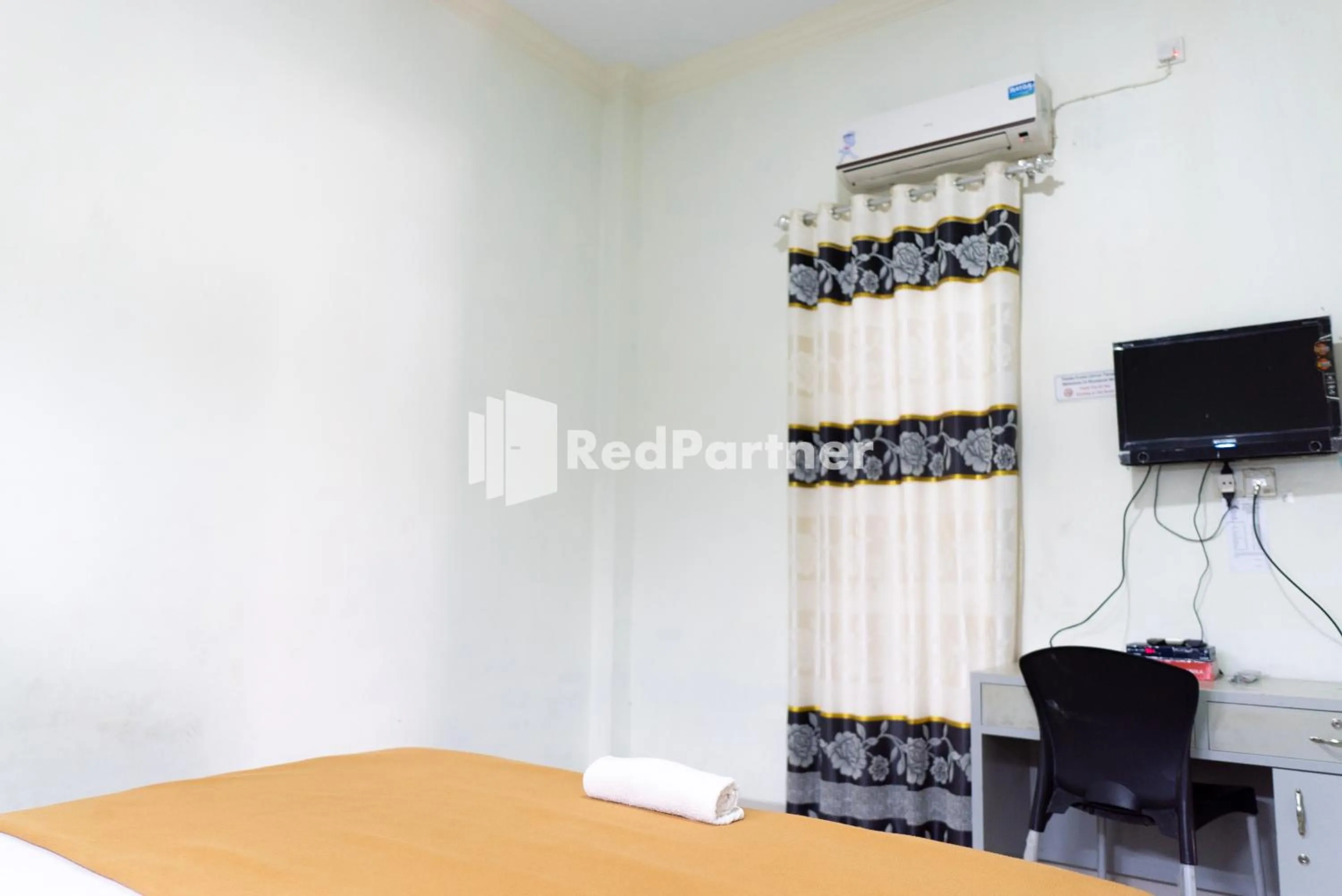 Bedroom in Wisma Aini Syariah Lampung Mitra RedDoorz