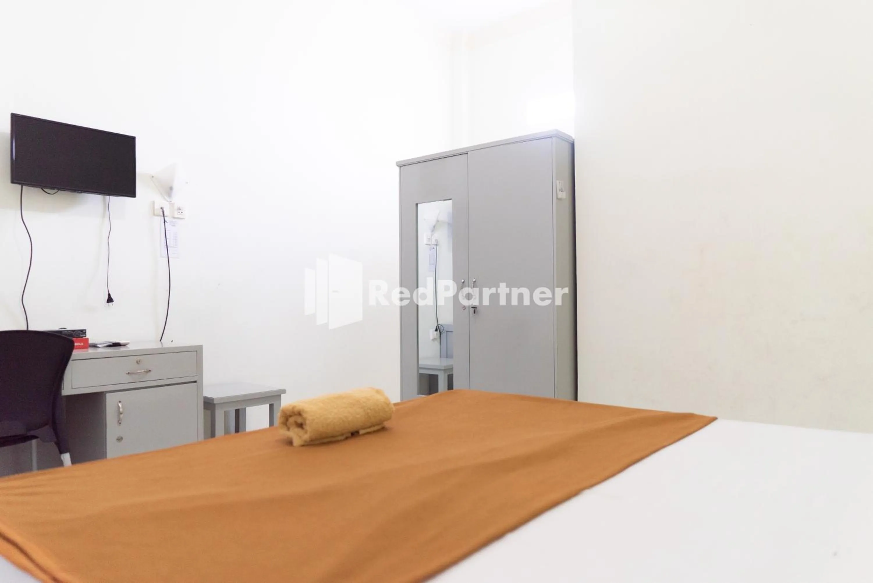 Bedroom in Wisma Aini Syariah Lampung Mitra RedDoorz