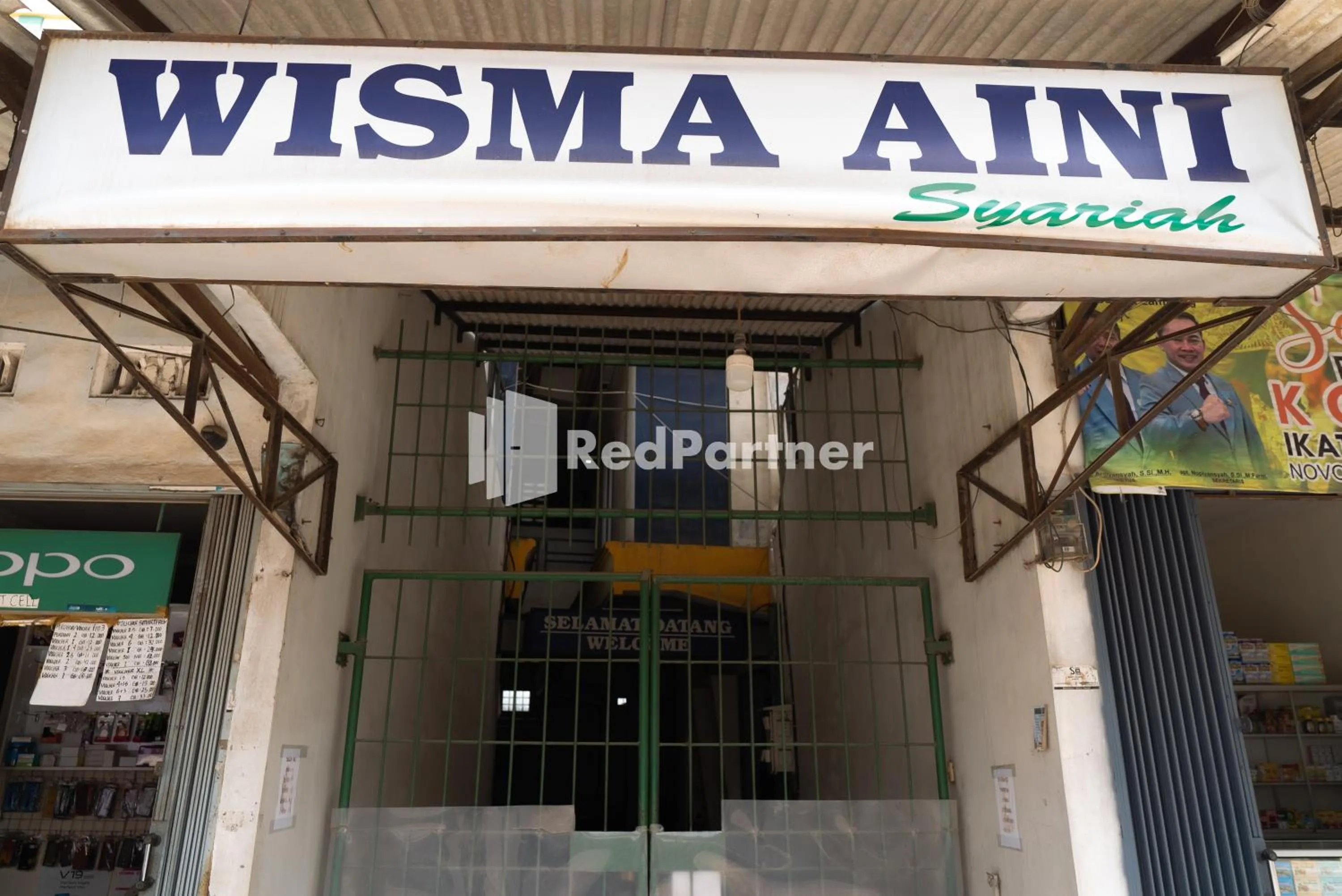Facade/entrance in Wisma Aini Syariah Lampung Mitra RedDoorz