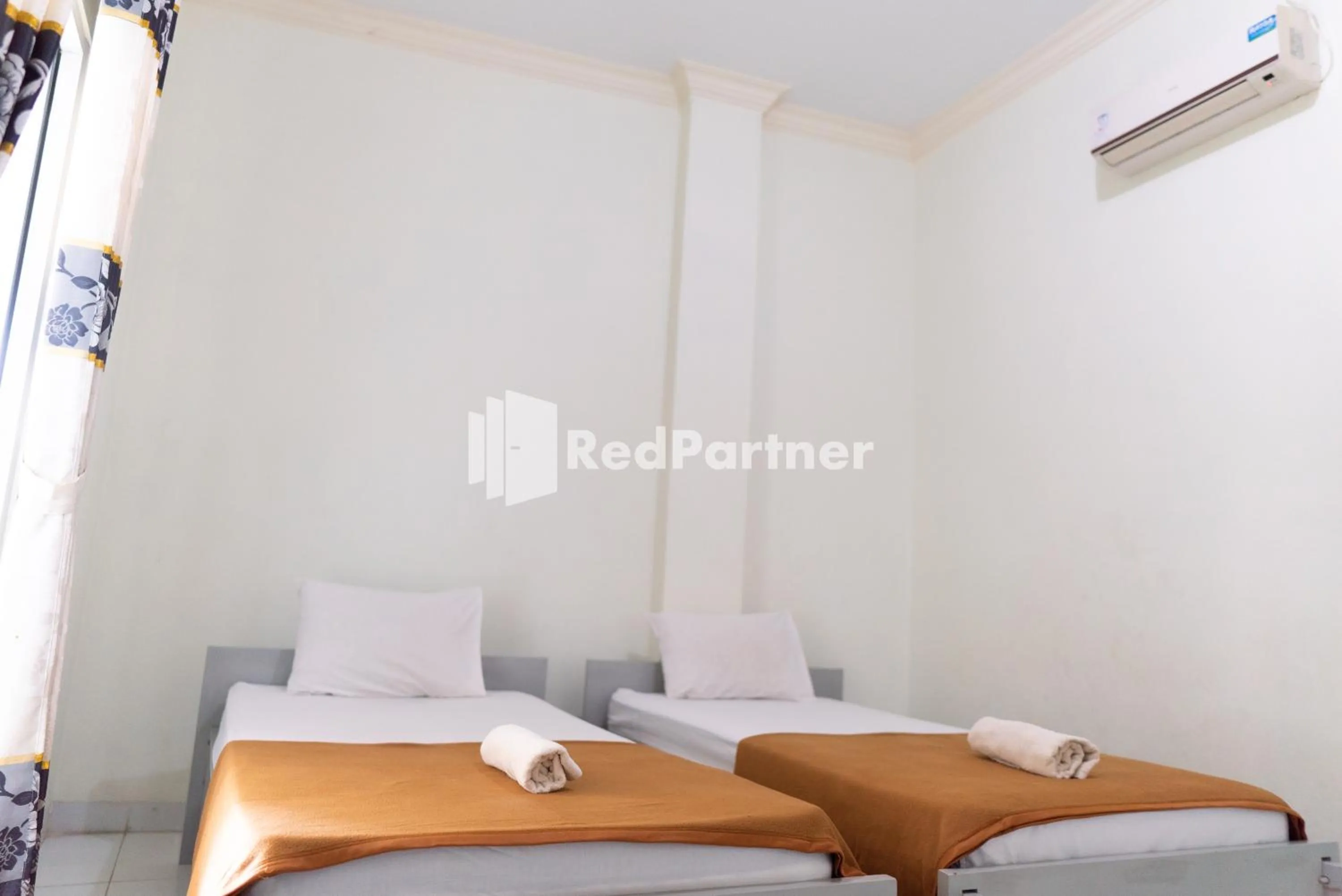 Bedroom, Bed in Wisma Aini Syariah Lampung Mitra RedDoorz