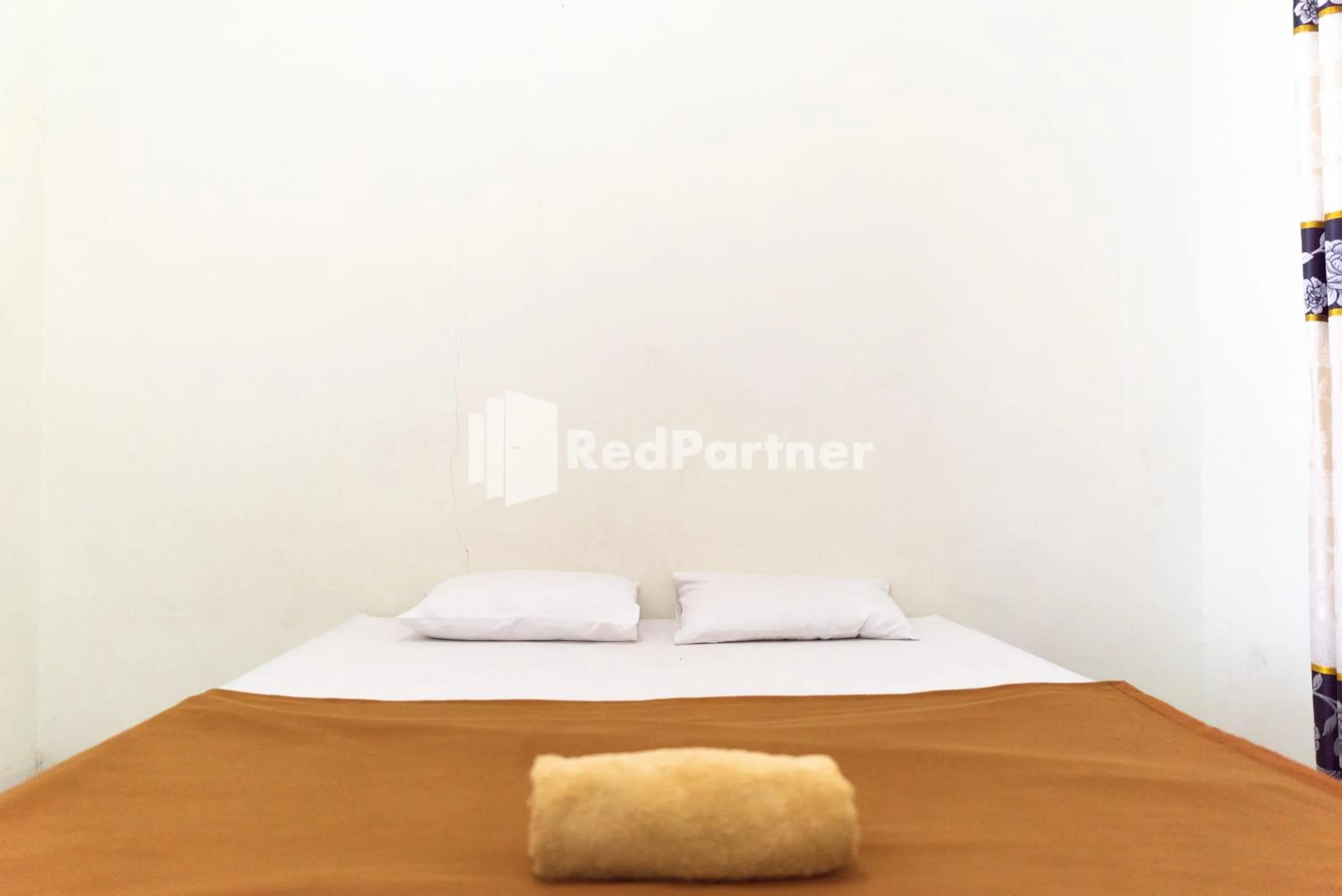 Bedroom, Bed in Wisma Aini Syariah Lampung Mitra RedDoorz