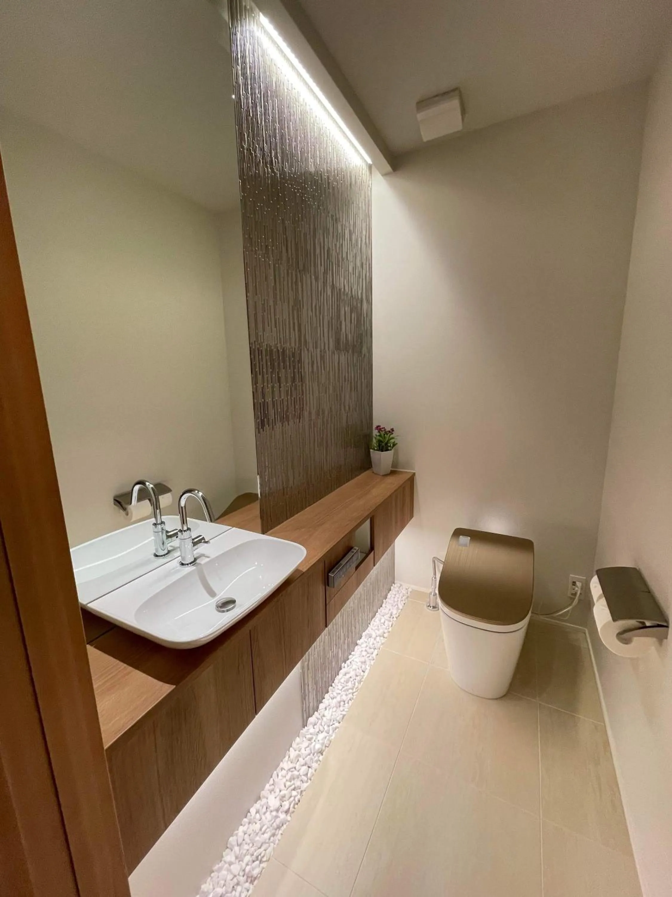 Toilet in Silver Maple Chalet by Hakuba White Fox Company