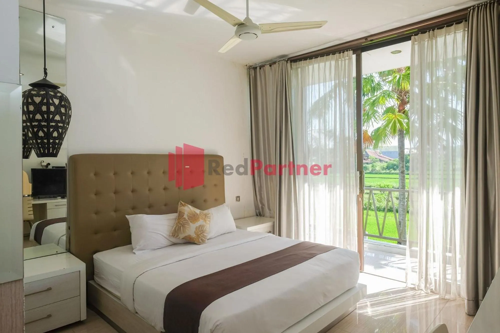 Bed in Sawah Joglo Boutique Villa Mitra RedDoorz