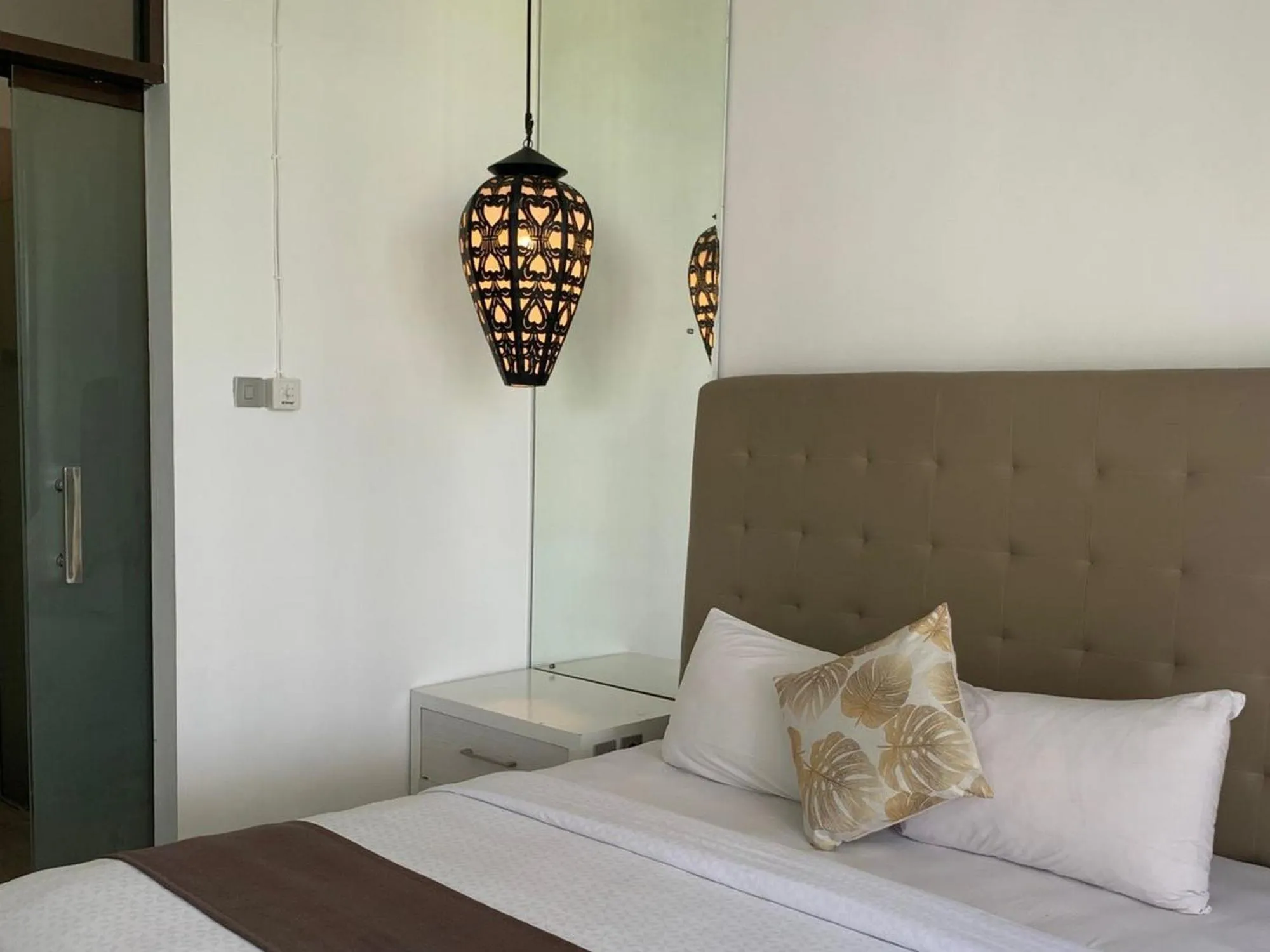 Bed in Sawah Joglo Boutique Villa Mitra RedDoorz