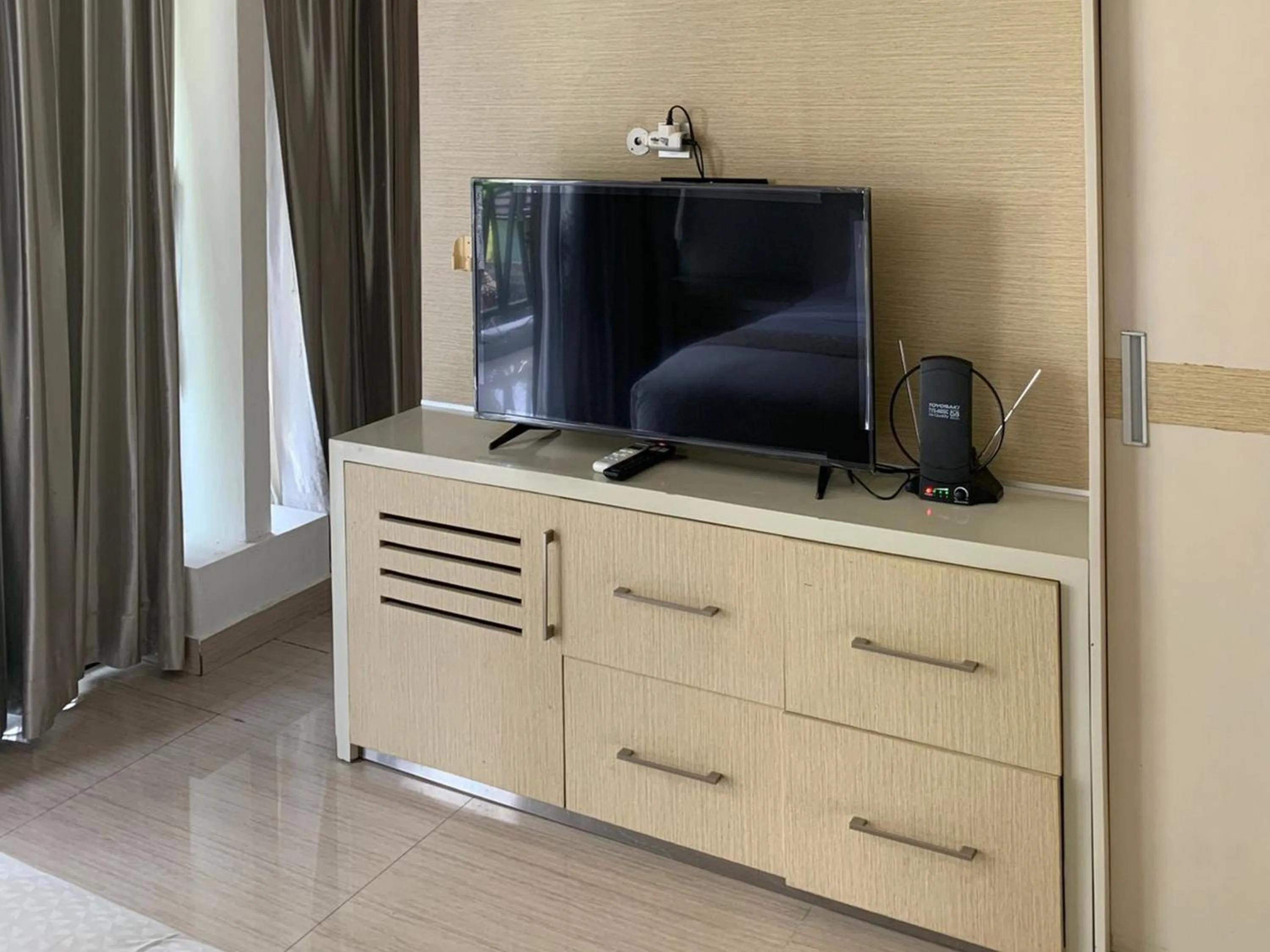 TV and multimedia in Sawah Joglo Boutique Villa Mitra RedDoorz