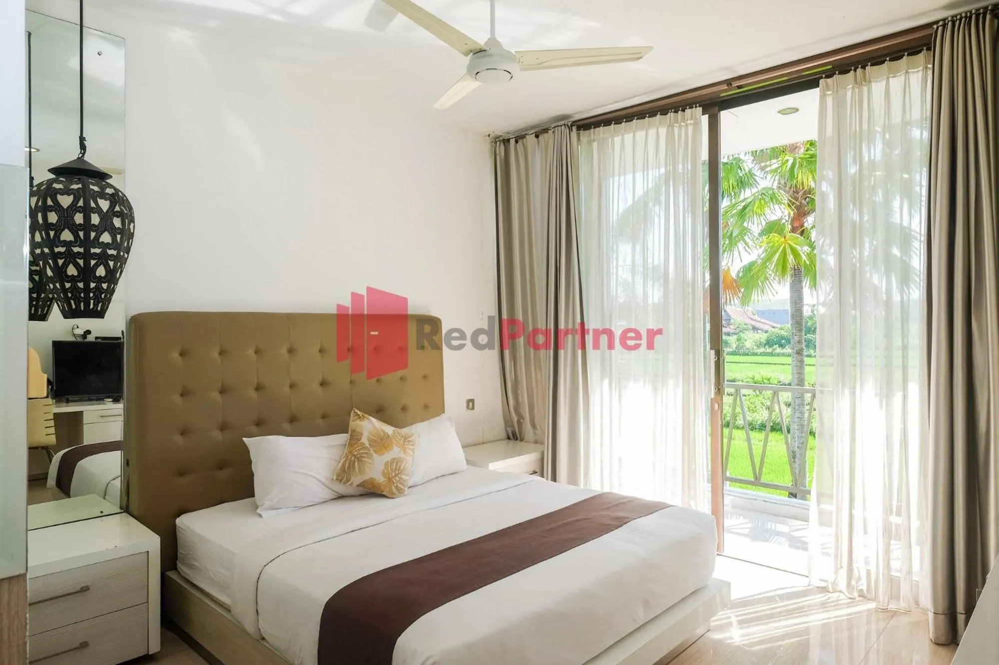 Bed in Sawah Joglo Boutique Villa Mitra RedDoorz