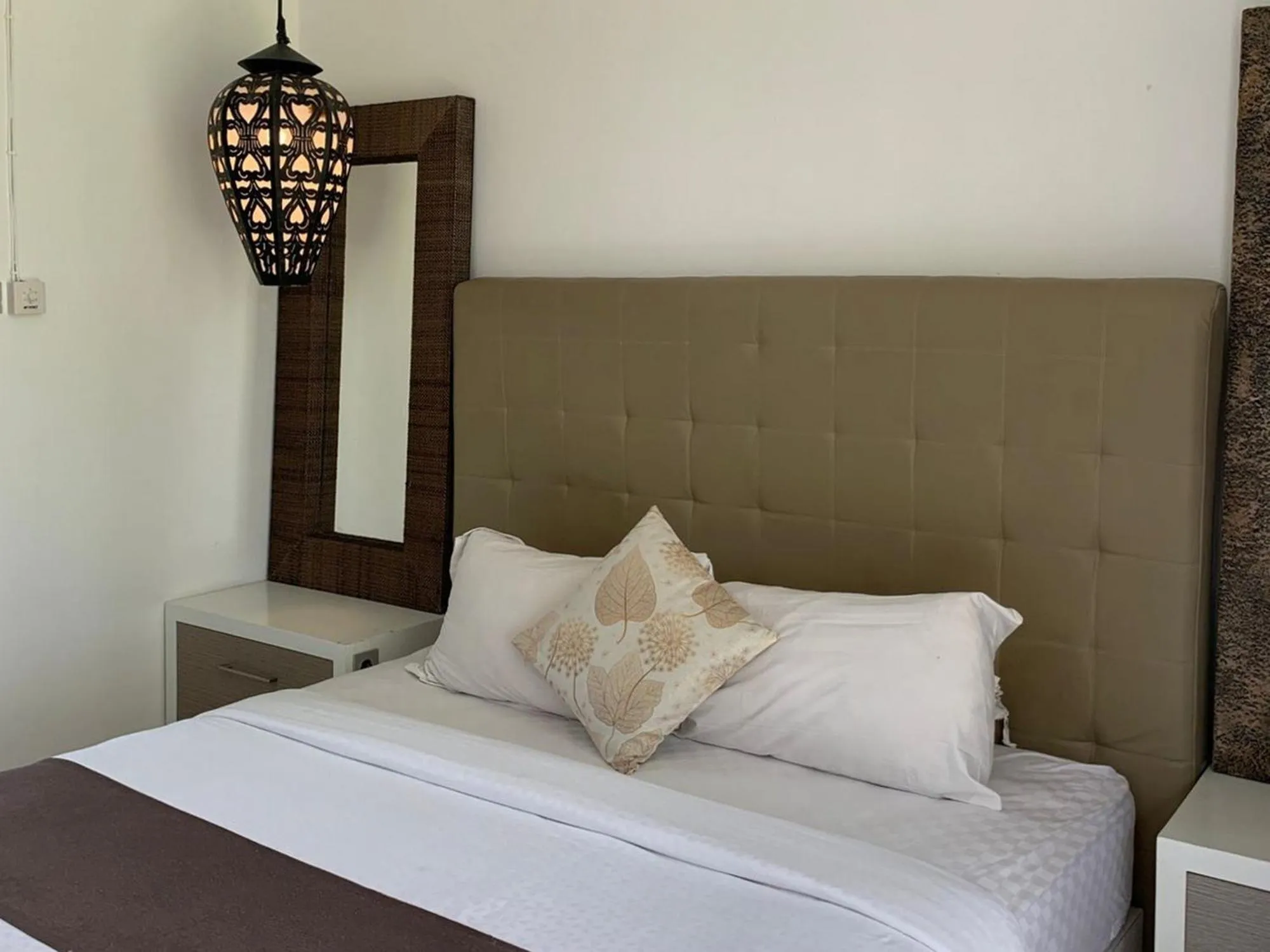 Bed in Sawah Joglo Boutique Villa Mitra RedDoorz