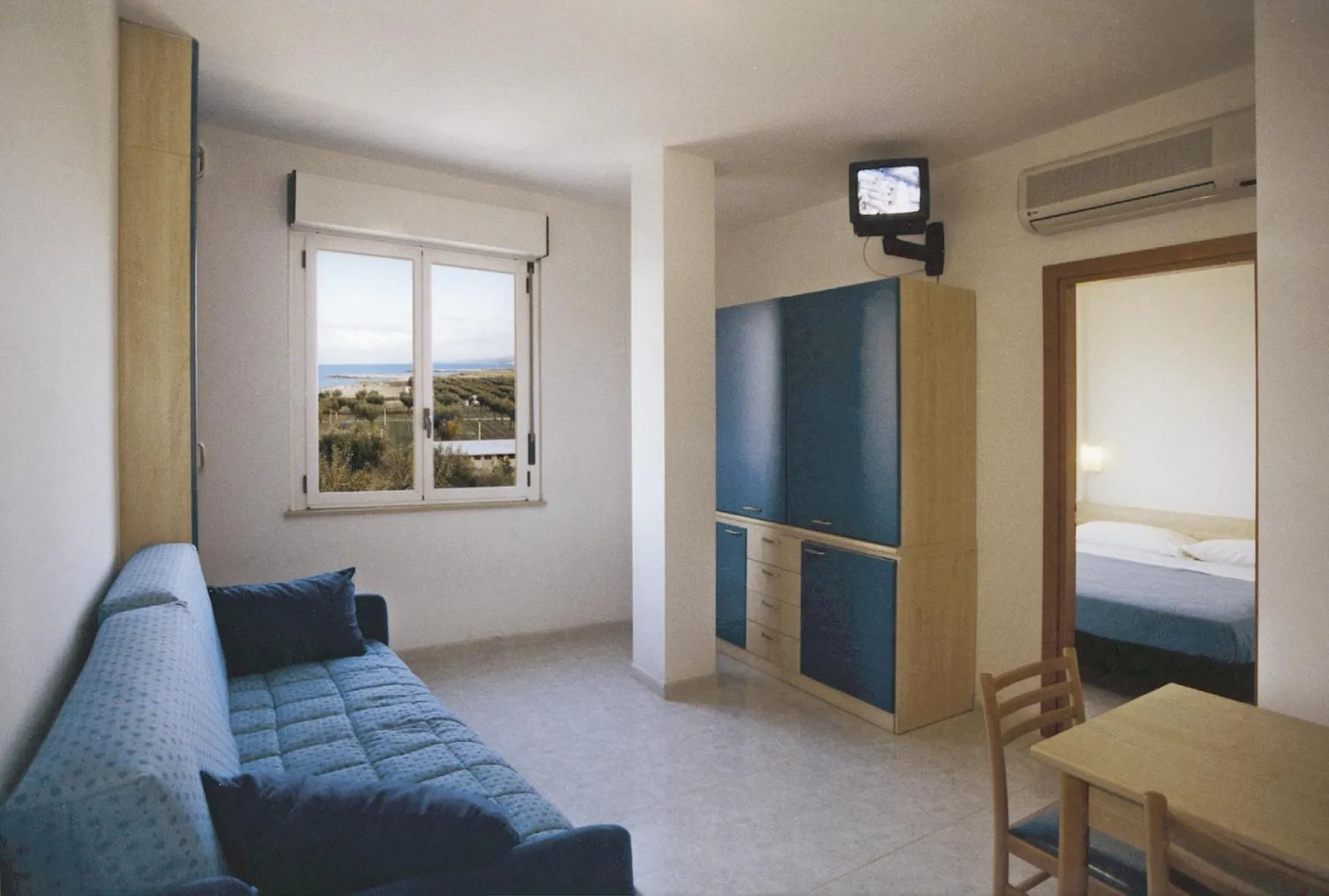 Seating area, Bed in Hotel Strand