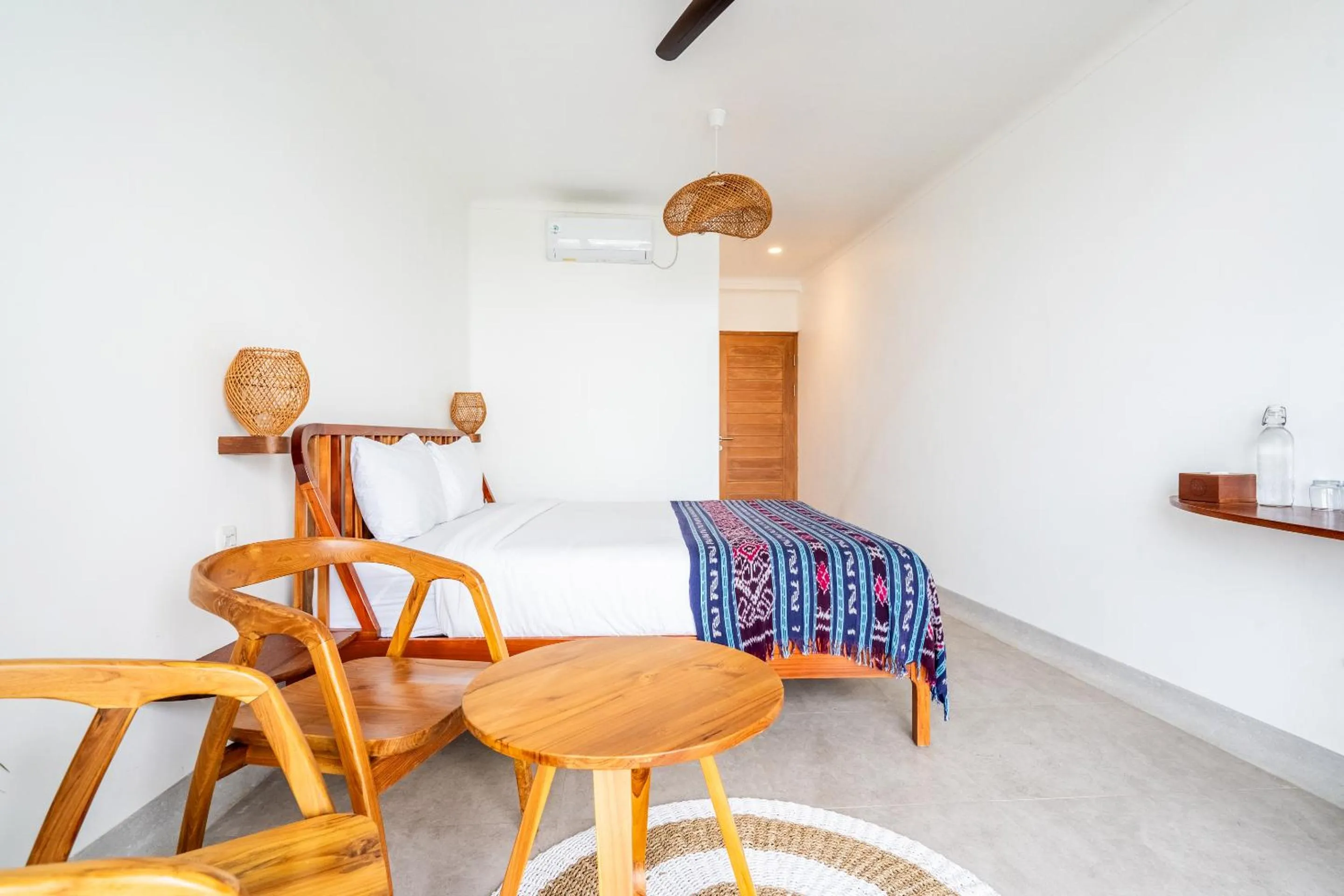 Bed in Inlight Lombok Beach Hotel