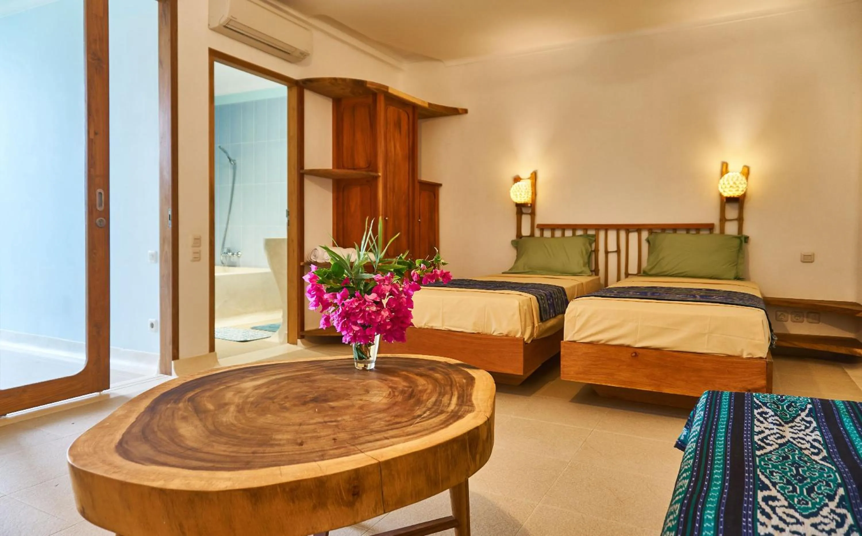 Bed in Inlight Lombok Beach Hotel