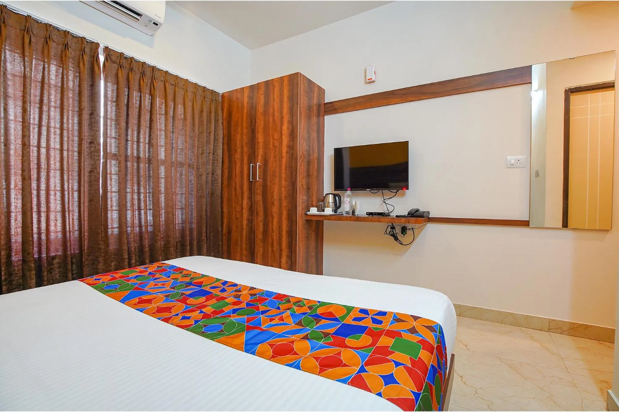 Photo of the whole room, Bed in FabHotel Greenwood Xpress Inn - Nr Manipal Hospital