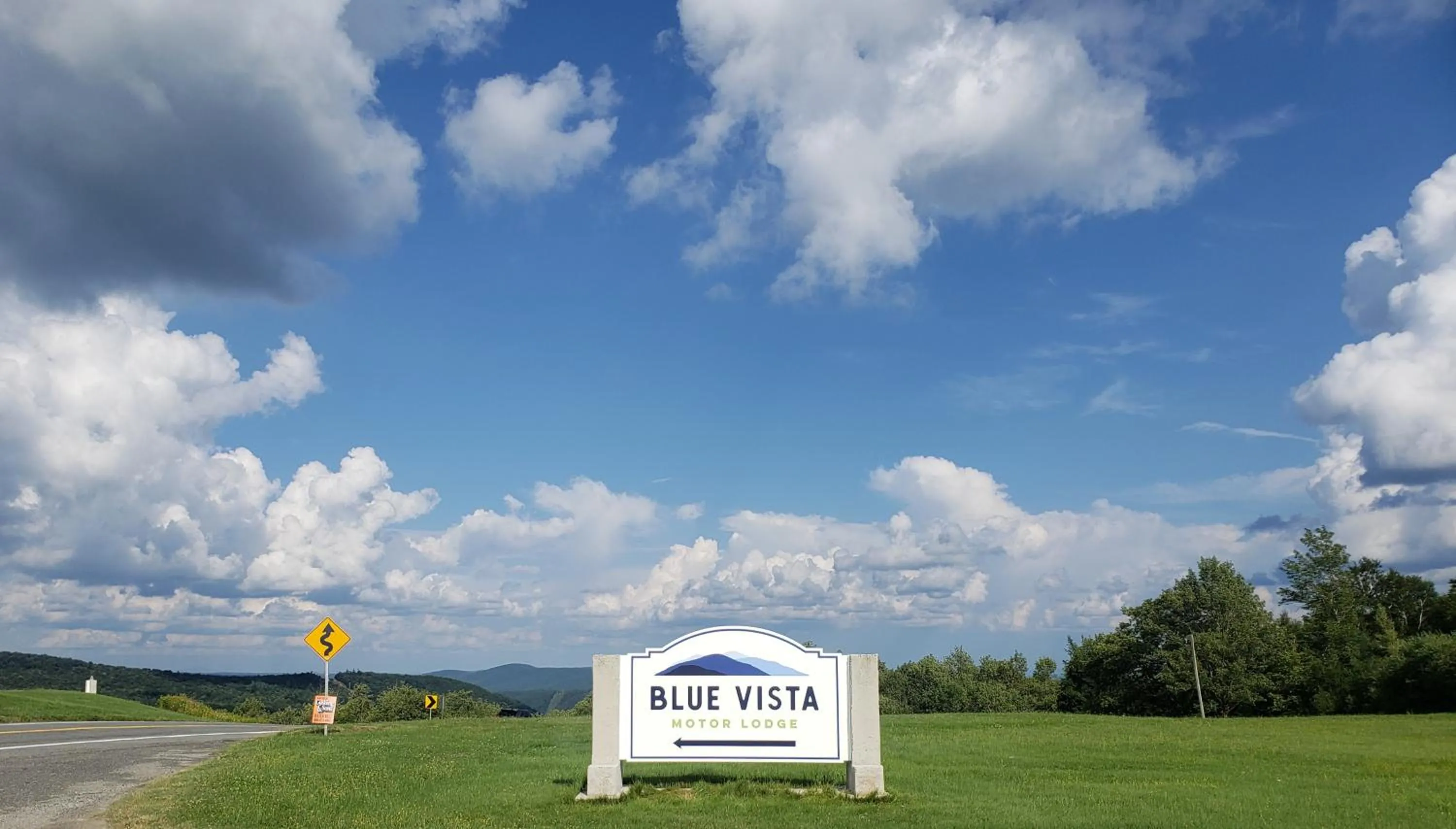 Property logo or sign in Blue Vista Motor Lodge