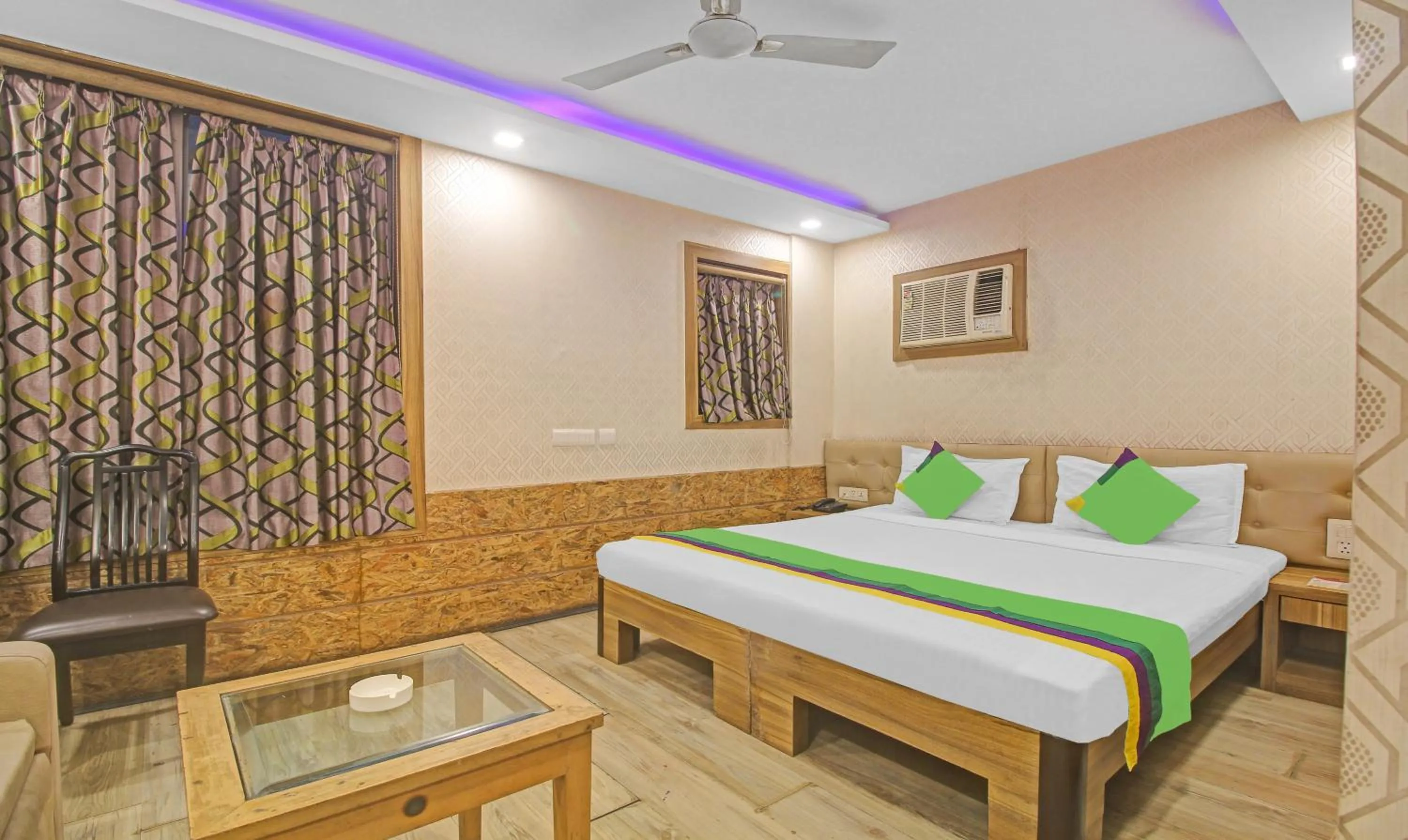 Bedroom, Bed in Treebo Mangalam, Bhawanipur