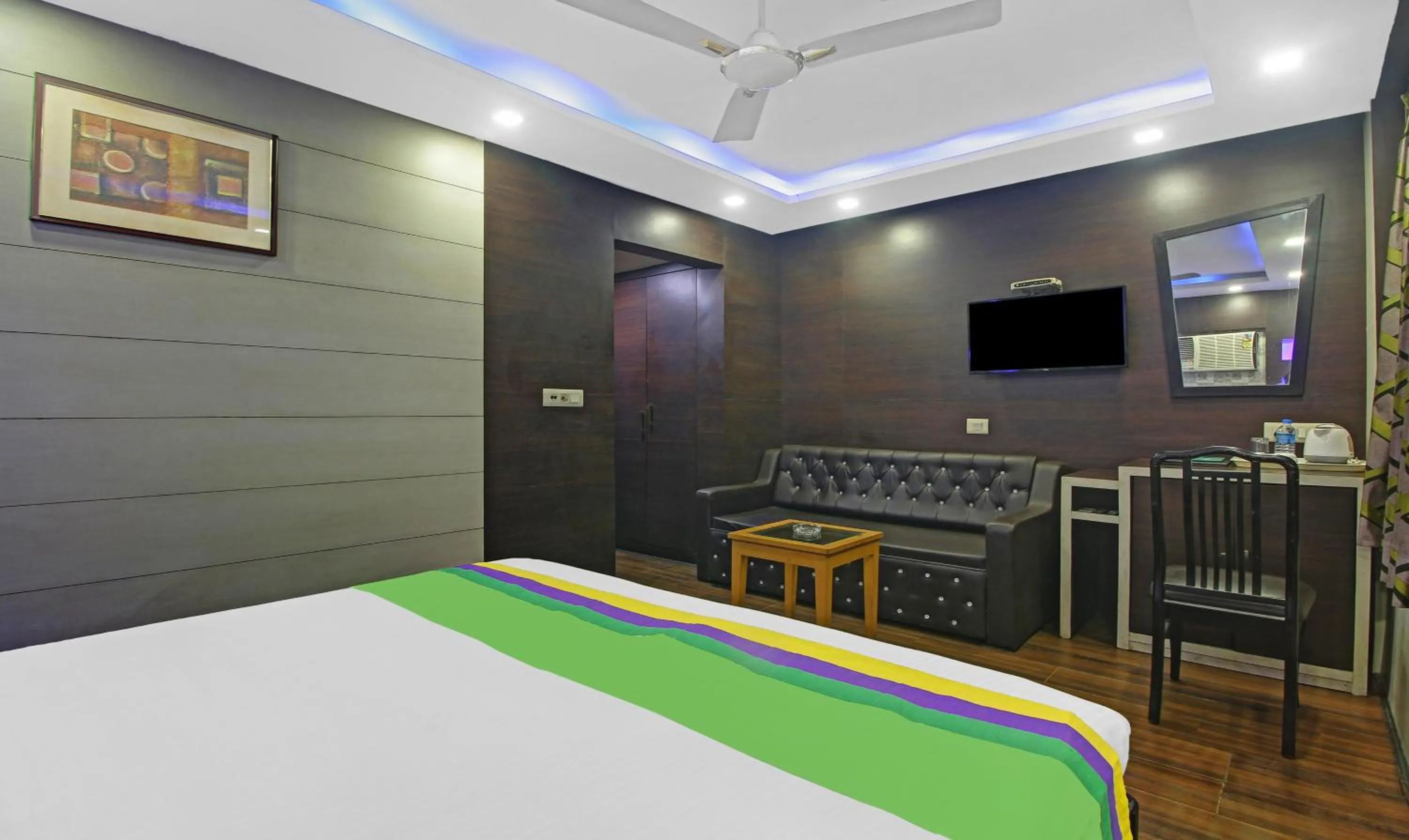 Bedroom, Bed in Treebo Mangalam, Bhawanipur