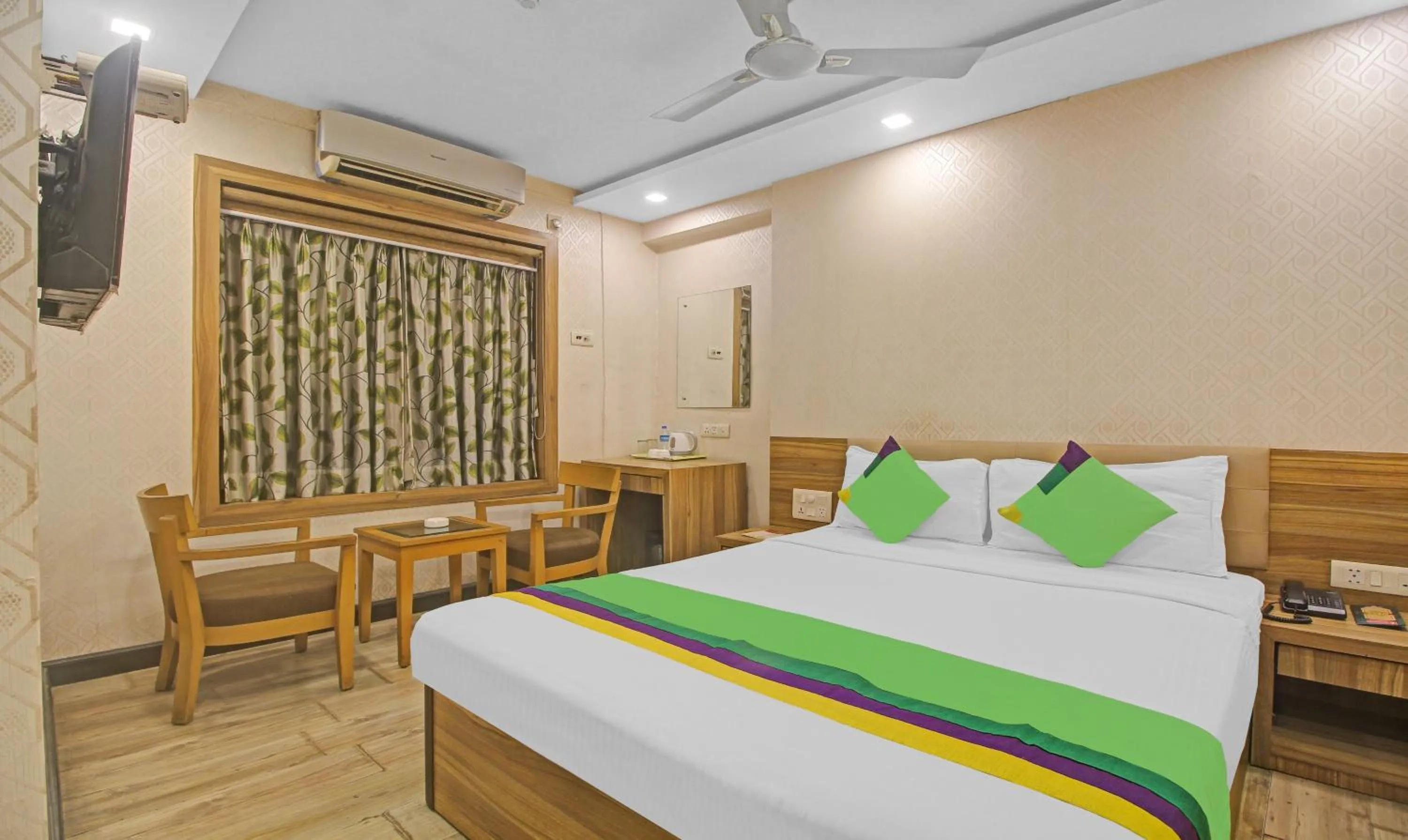 Bedroom, Bed in Treebo Mangalam, Bhawanipur