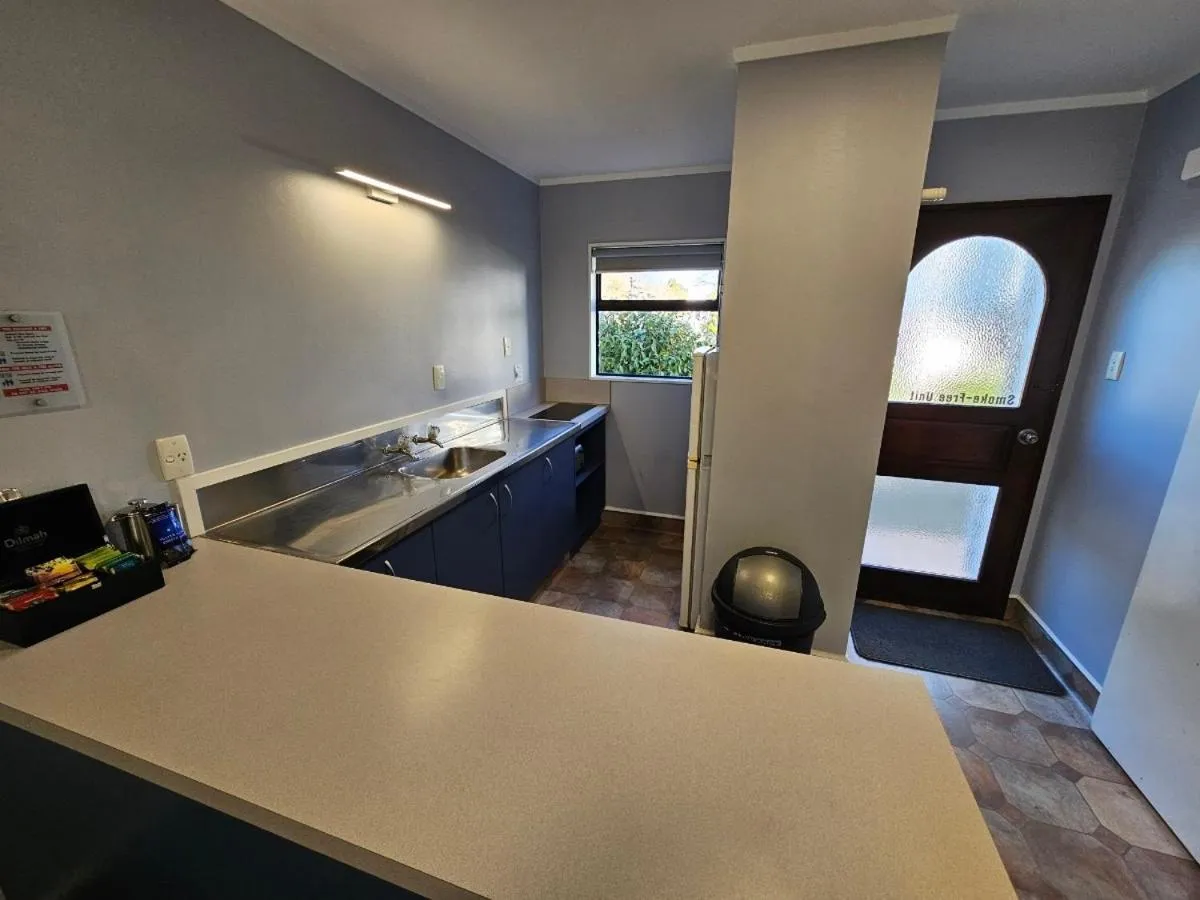 Bed in Hacienda Motor Lodge