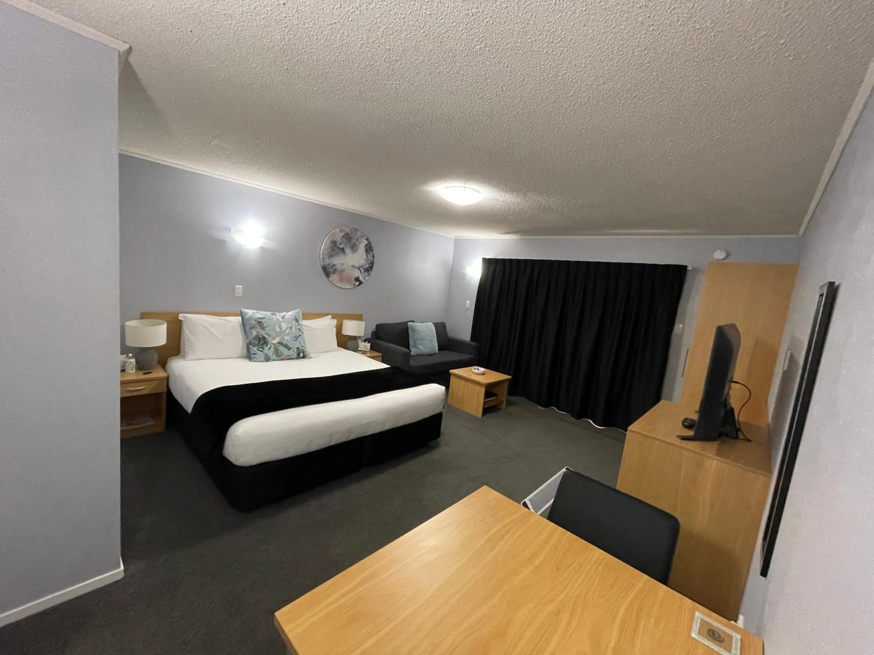 Bed in Hacienda Motor Lodge