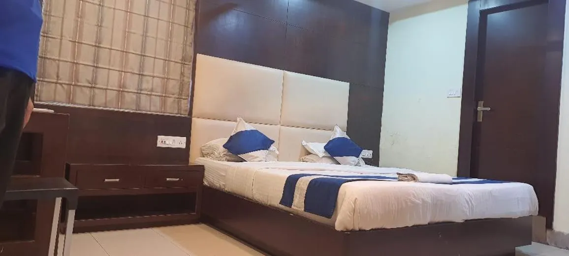 Bed in Hotel Presidency Inn