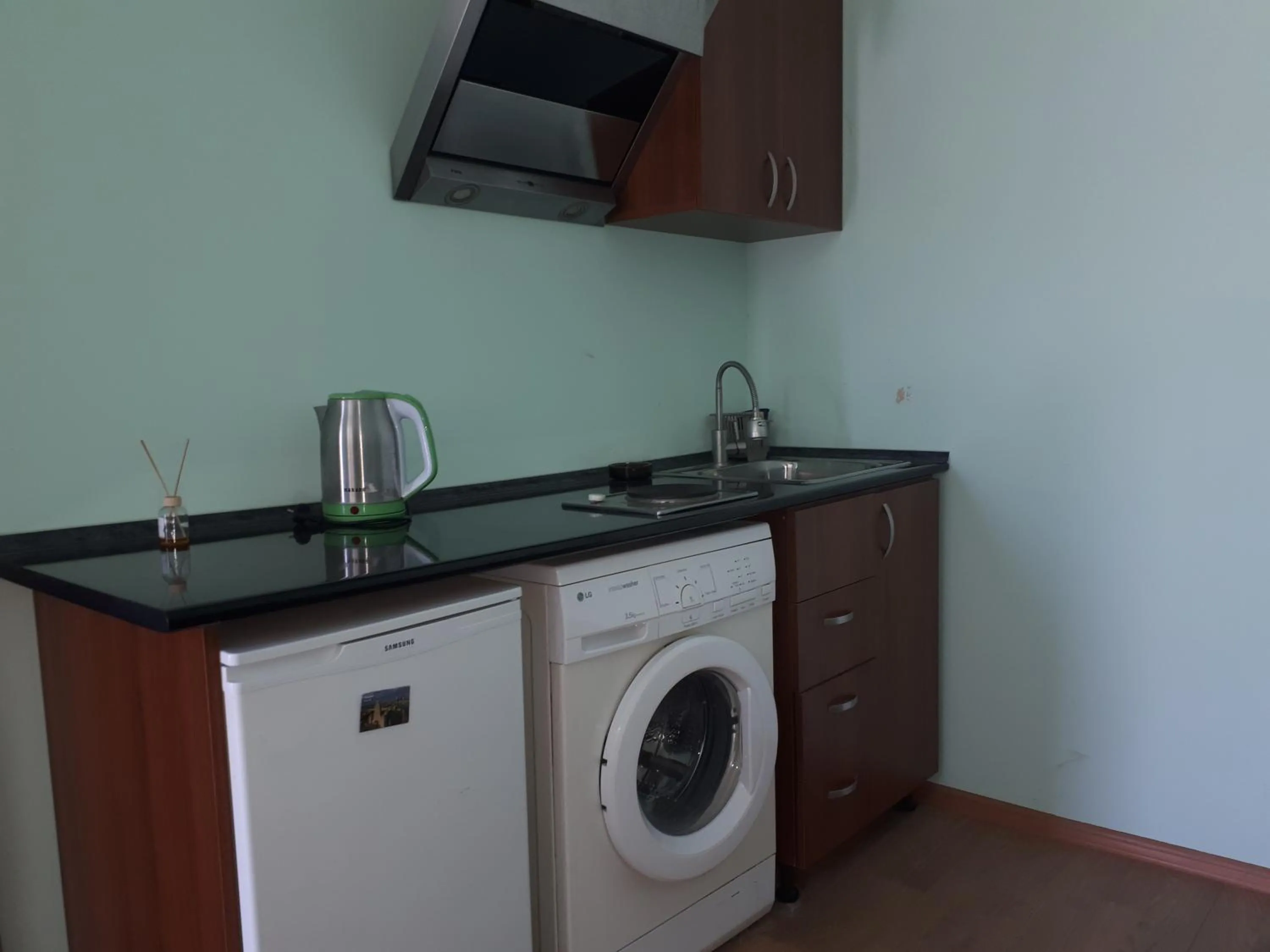 Kitchen or kitchenette in Art Guest House in KASKAD