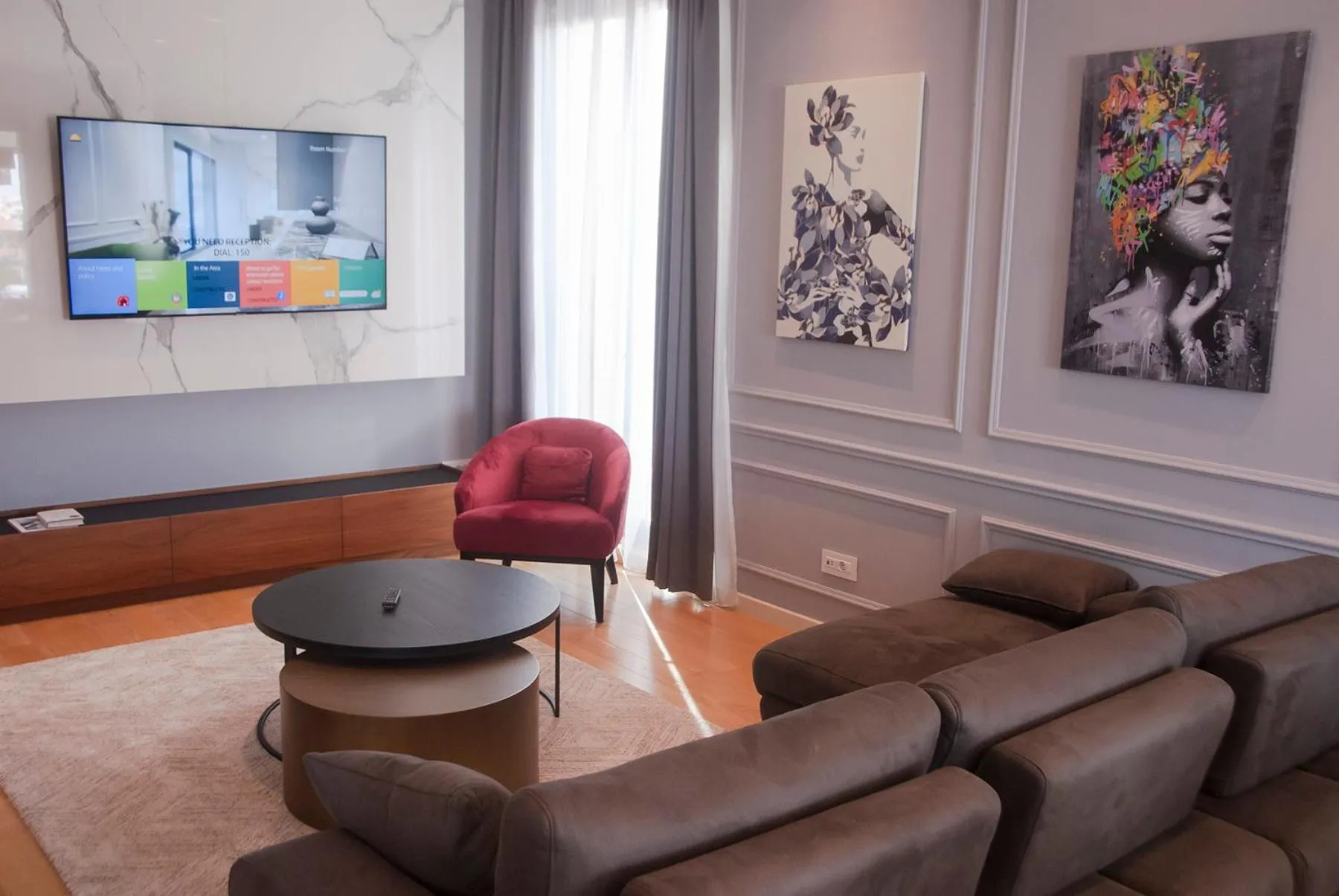 Communal lounge/ TV room in H41 Luxury Suites