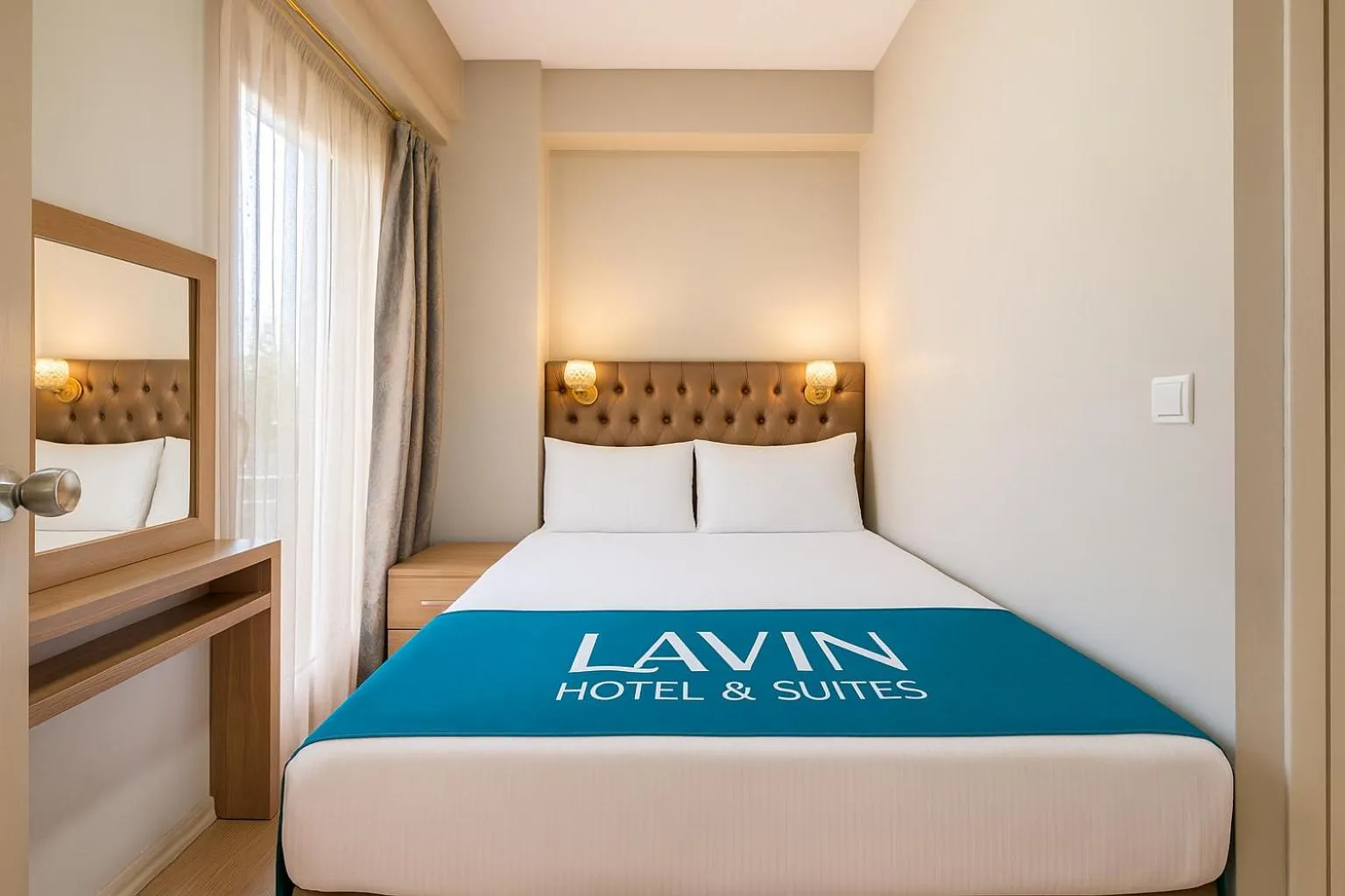 Bed in Lavin Hotel & Suites