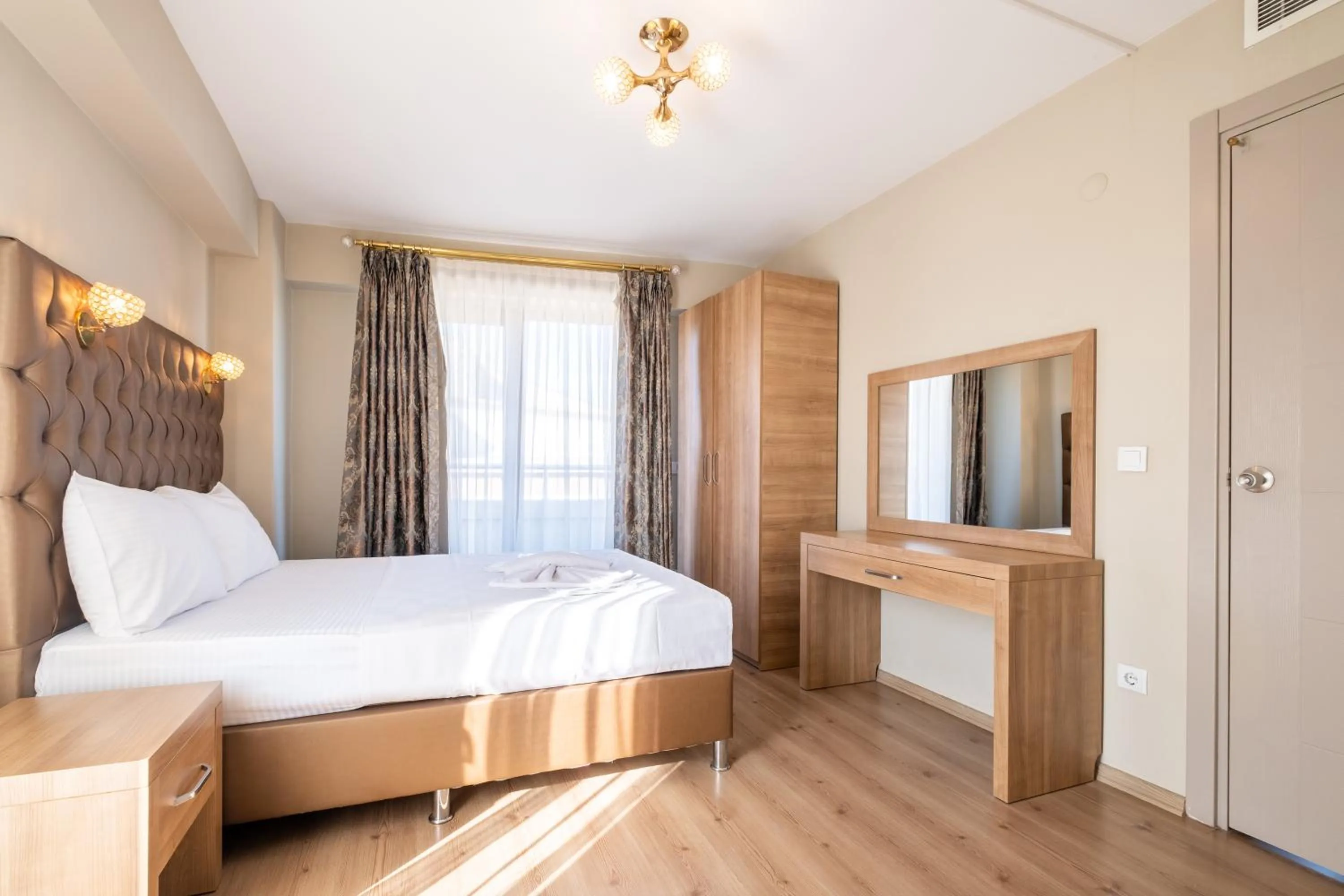 Bed in Lavin Hotel & Suites