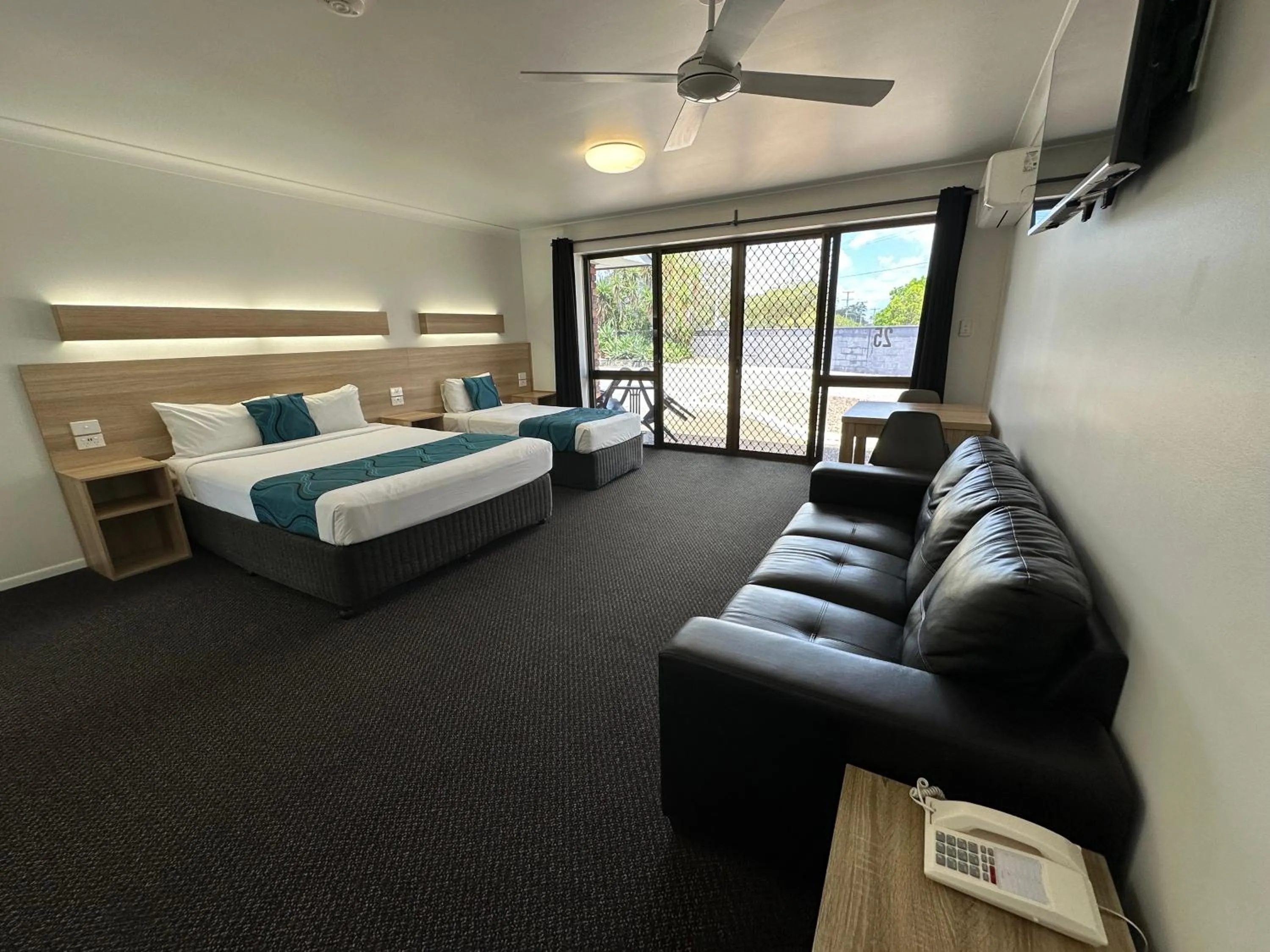 View (from property/room), Bed in Logan City Motor Inn