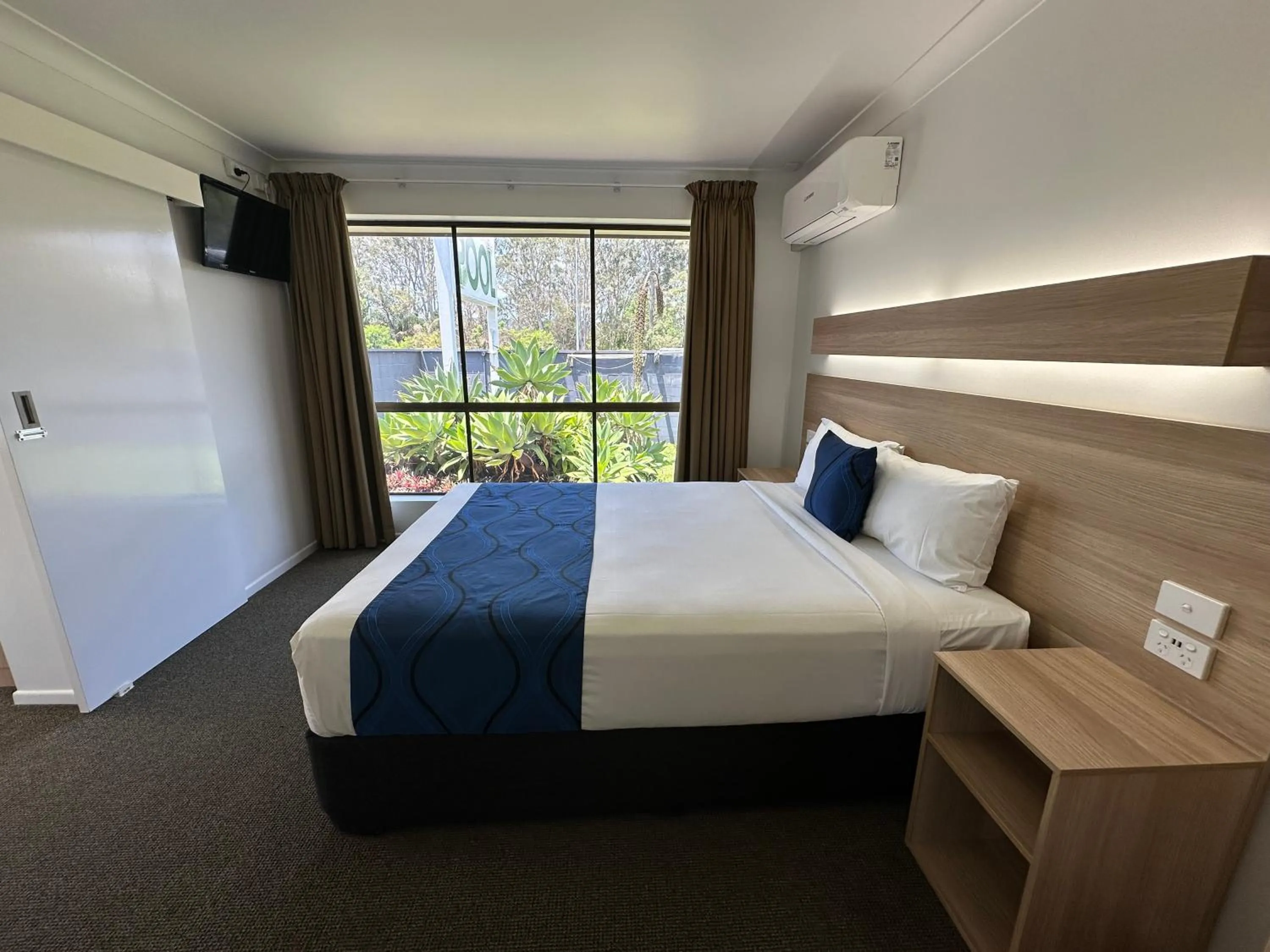 Bedroom, Bed in Logan City Motor Inn