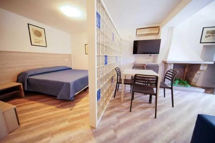 Photo of the whole room, Bed in Hotel Capo Di Stella