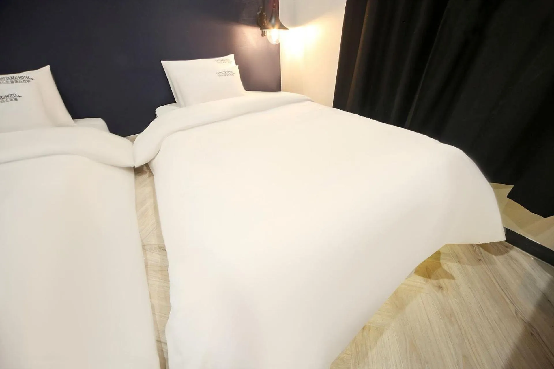 Bed in Masan First Class Hotel