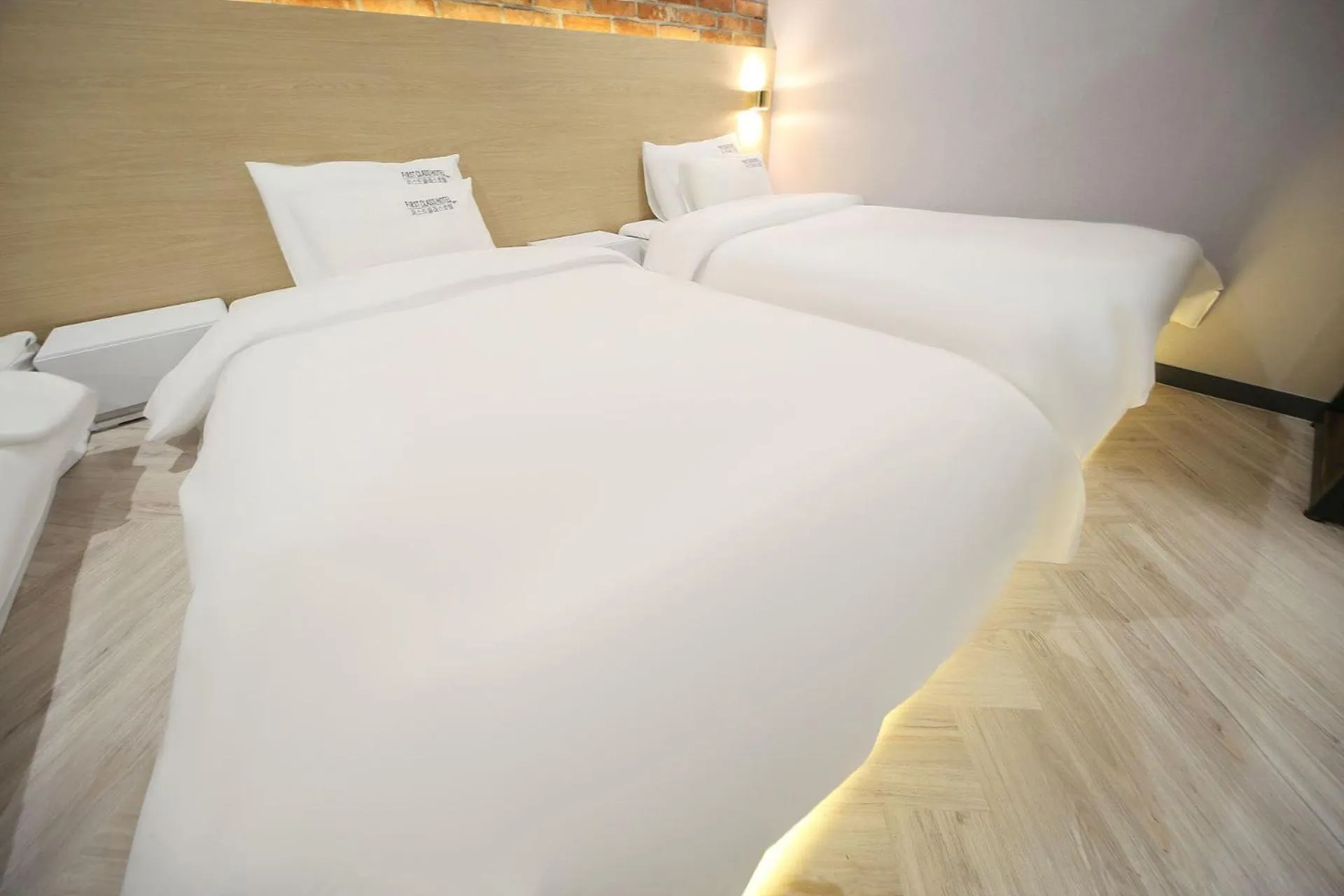 Bed in Masan First Class Hotel