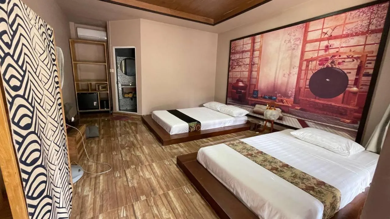 Bed in WHITE SAND ARK RESORT